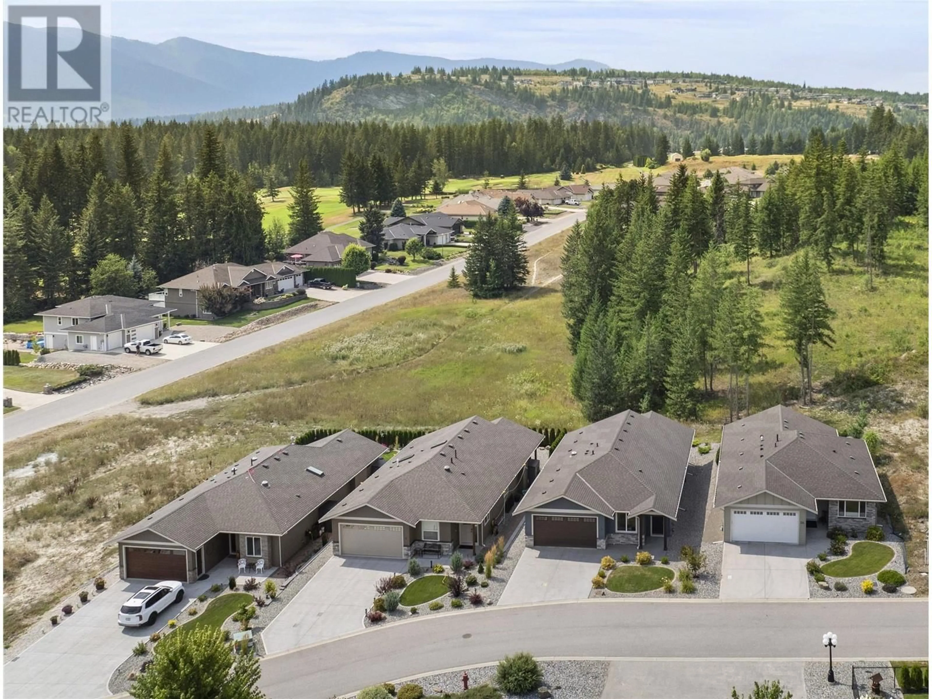 A pic from exterior of the house or condo, the street view for 2715 Golf Course Drive Unit# 26, Blind Bay British Columbia V0E1H1