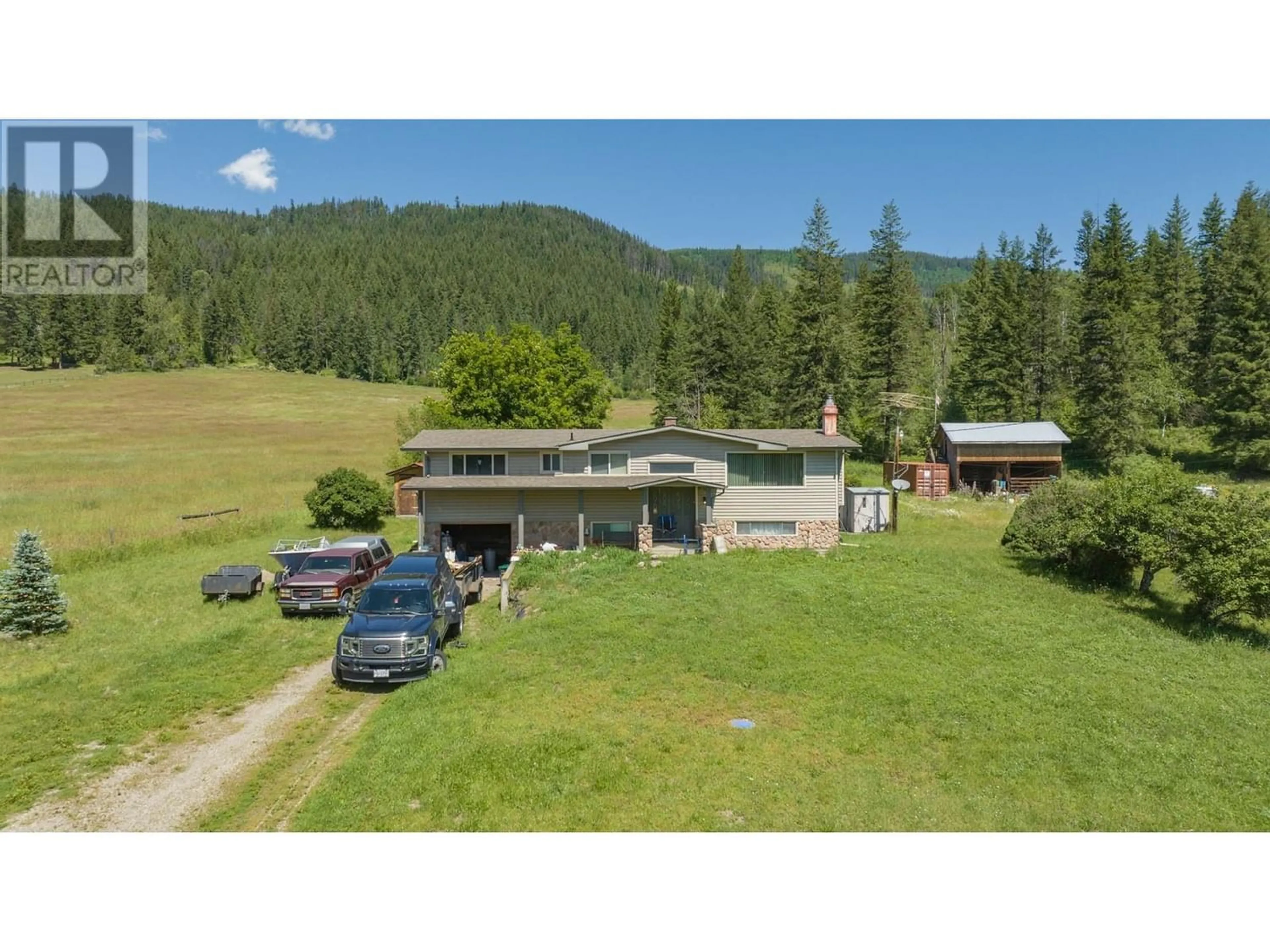 A pic from outside/outdoor area/front of a property/back of a property/a pic from drone, mountain view for 309 ALBERS ROAD, Lumby British Columbia V0E2G5