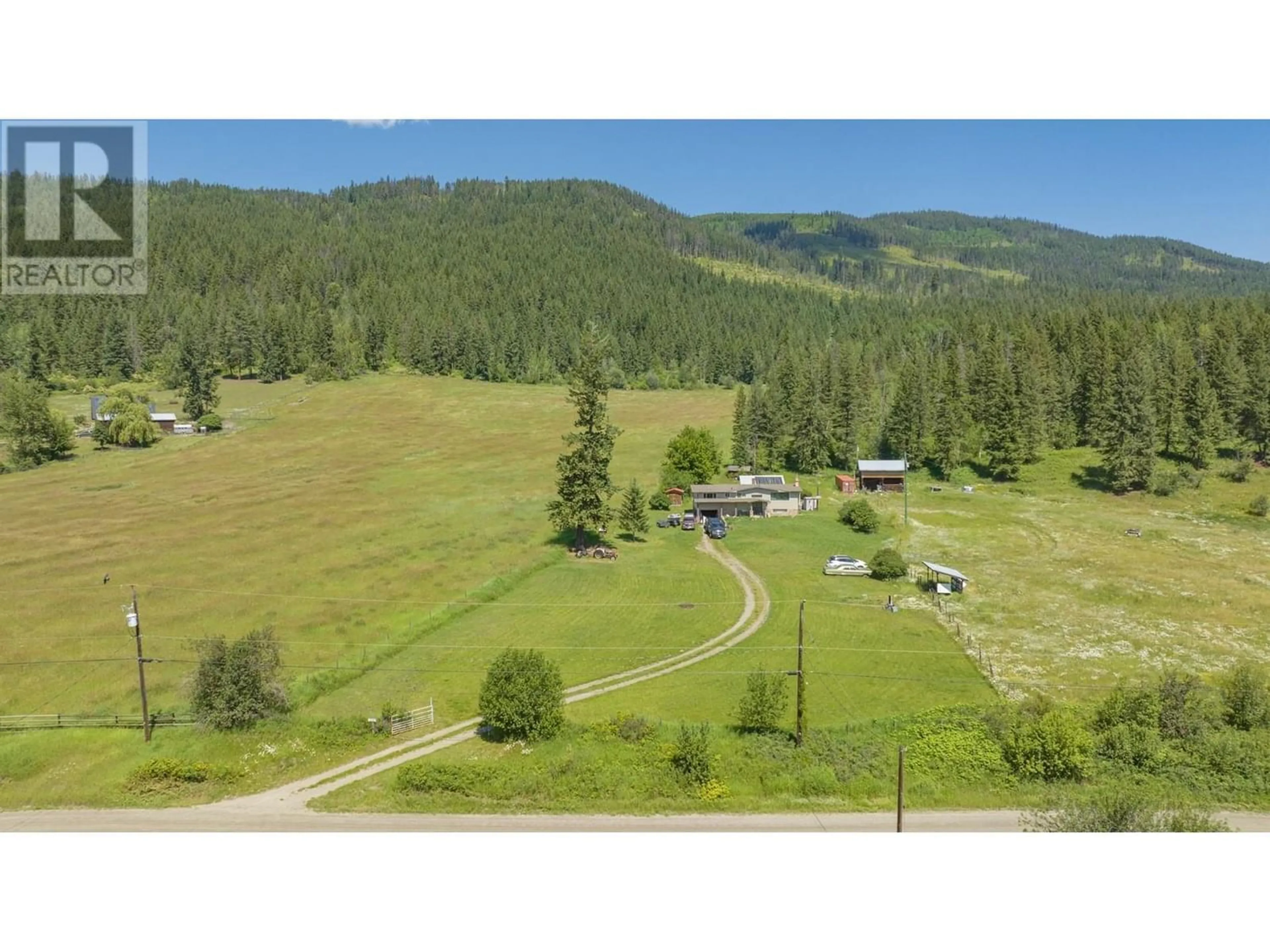 A pic from outside/outdoor area/front of a property/back of a property/a pic from drone, mountain view for 309 ALBERS ROAD, Lumby British Columbia V0E2G5