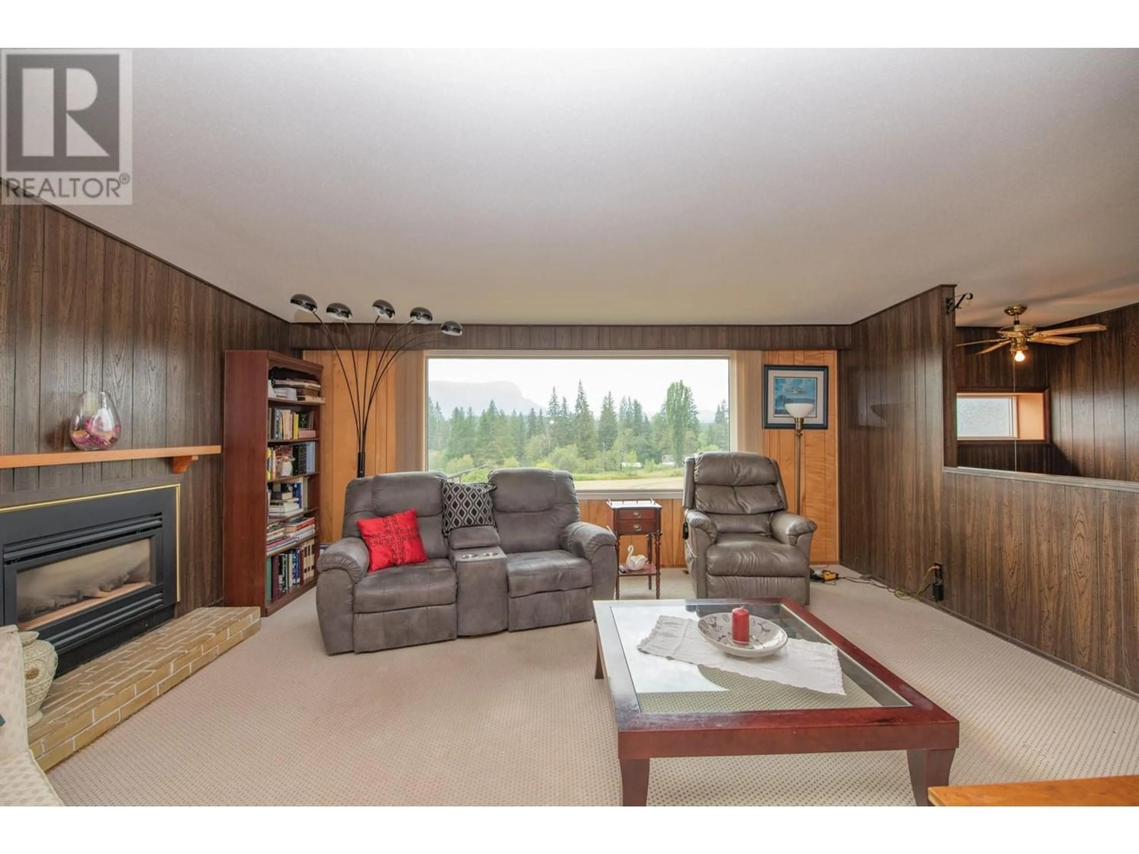 Living room with furniture, wood/laminate floor for 309 ALBERS ROAD, Lumby British Columbia V0E2G5