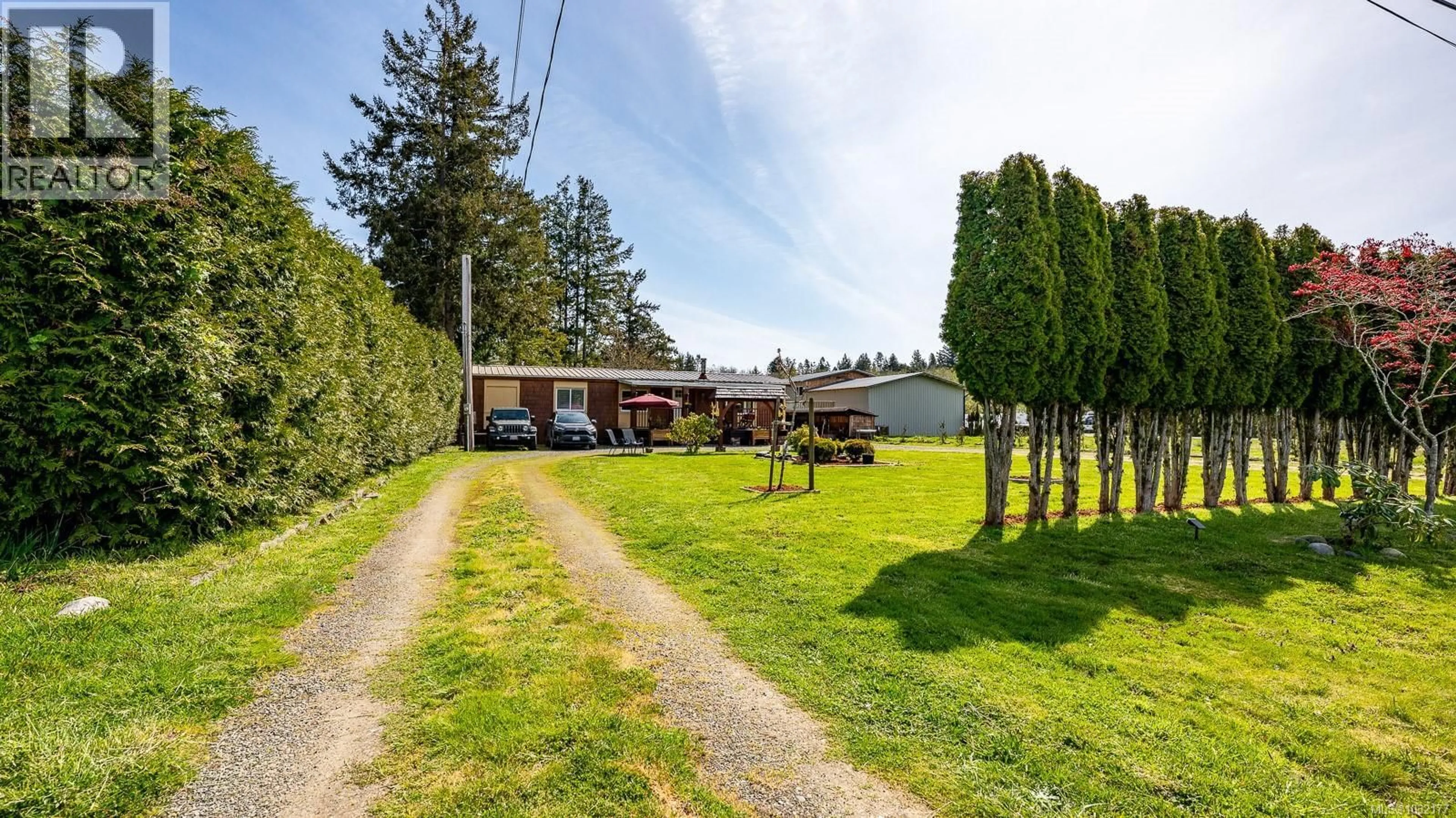 A pic from outside/outdoor area/front of a property/back of a property/a pic from drone, street for 1798 LITTLE RIVER ROAD, Comox British Columbia V9M4B9