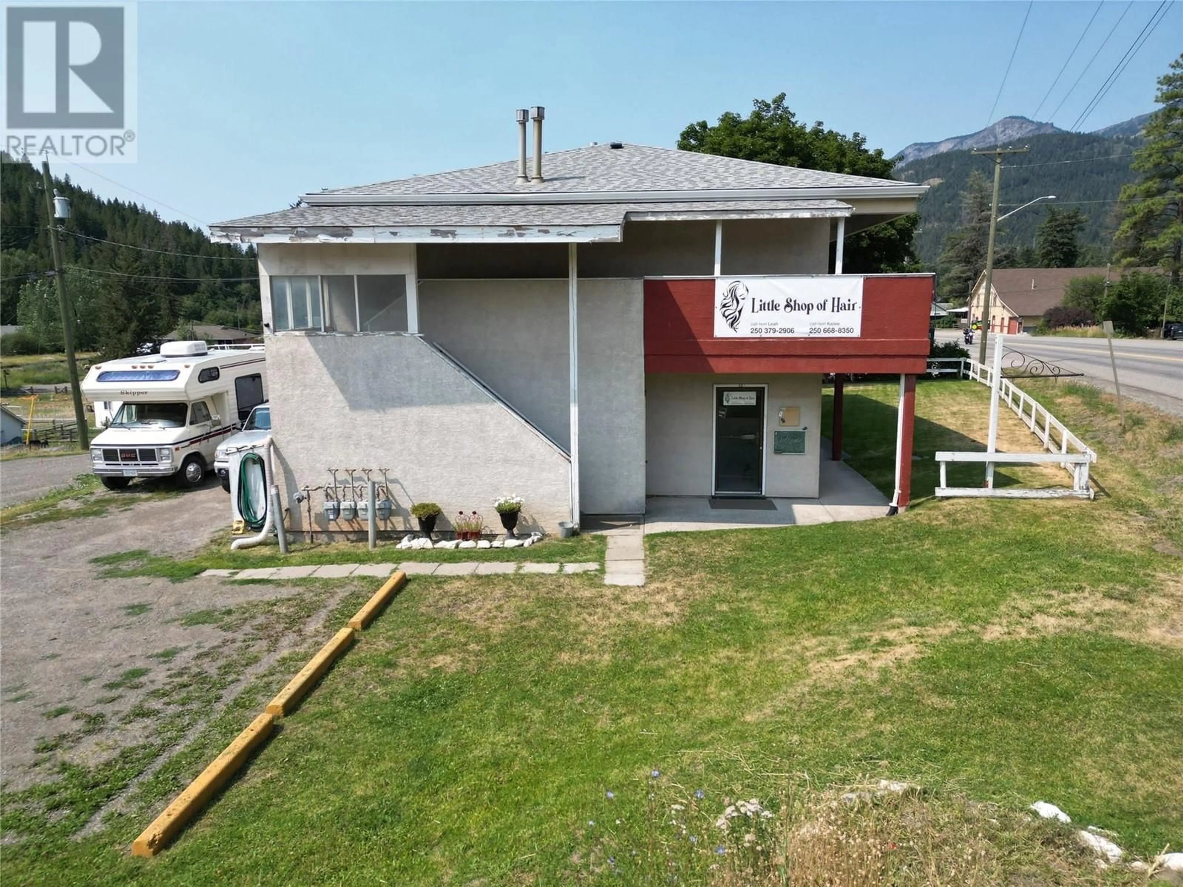 A pic from outside/outdoor area/front of a property/back of a property/a pic from drone, mountain view for 5683 97N Highway, Falkland British Columbia V0E1W0