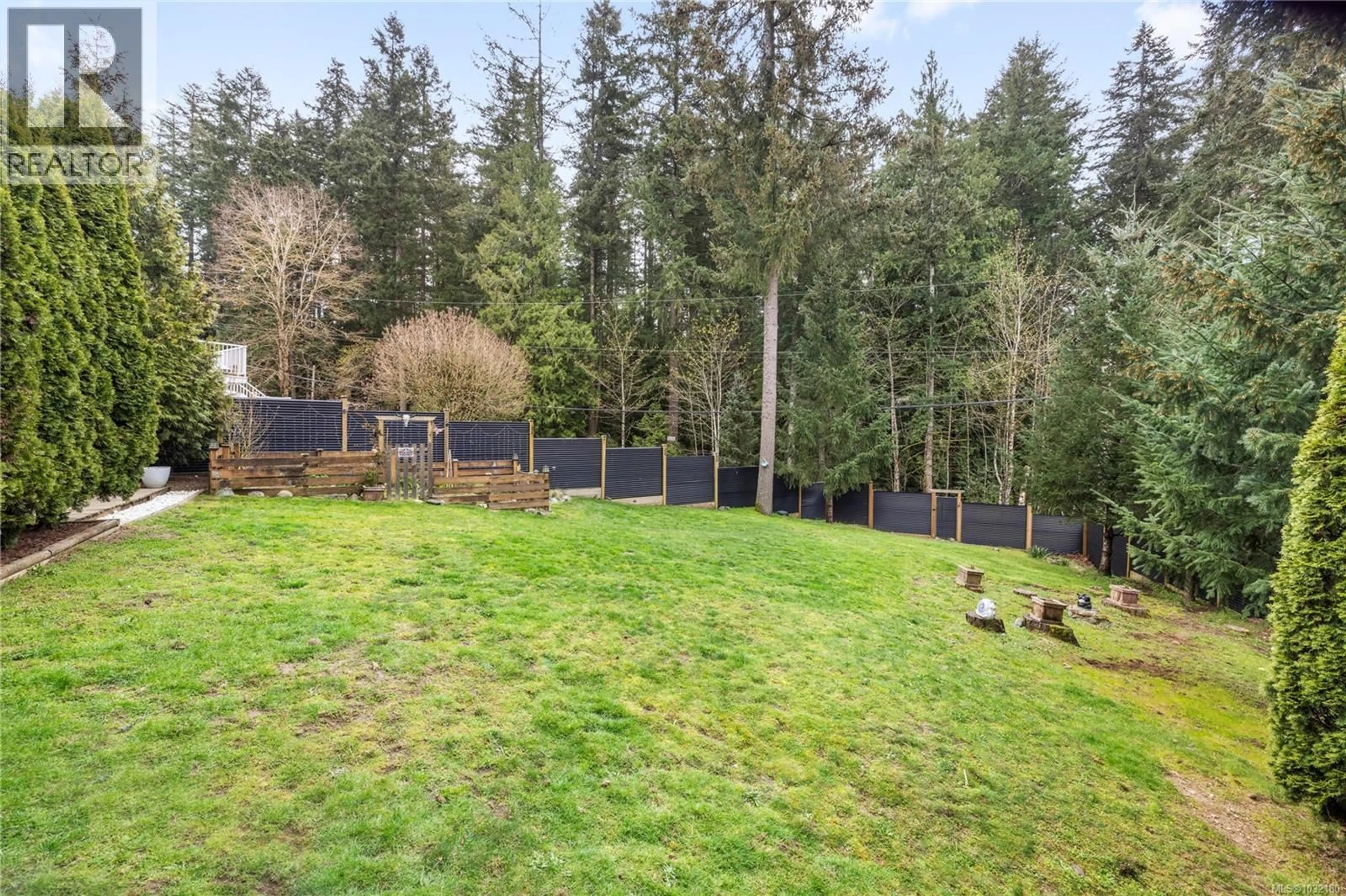 A pic from outside/outdoor area/front of a property/back of a property/a pic from drone, forest/trees view for 5419 COLINWOOD DRIVE, Nanaimo British Columbia V9T6G2