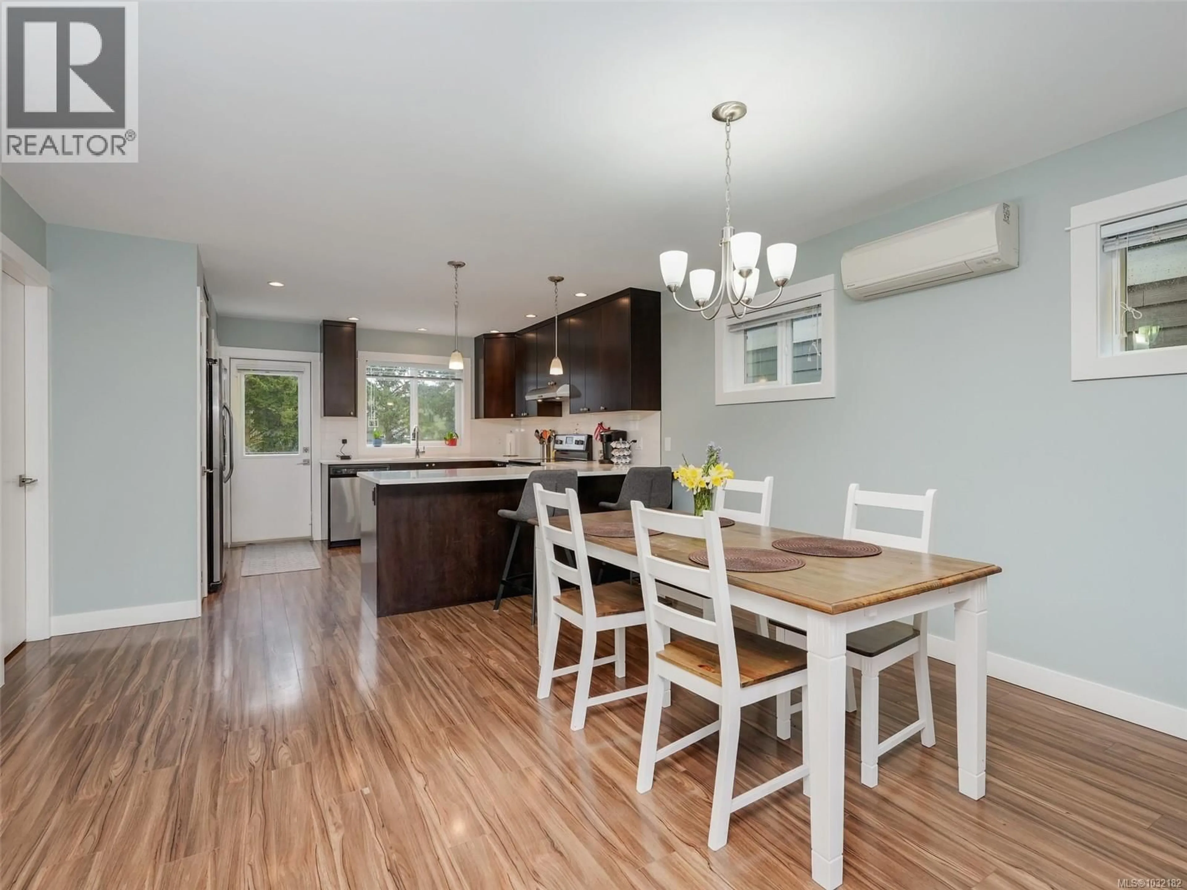 Open concept kitchen, wood/laminate floor for 1015 FOXWOOD PLACE, Langford British Columbia V9C0H5