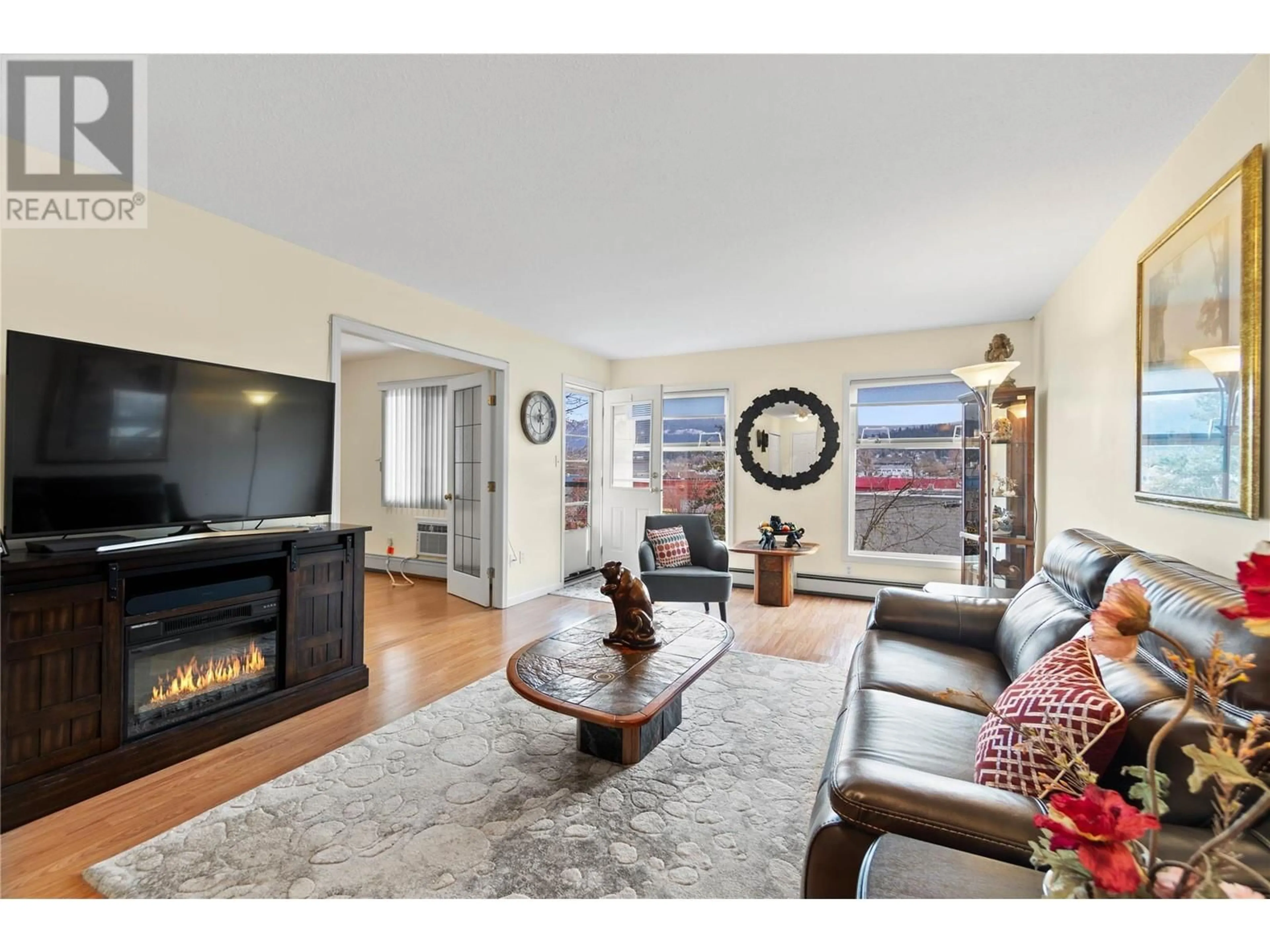 Living room, wood floors for 851 5 Avenue SW Unit# 304, Salmon Arm British Columbia V1E1K2