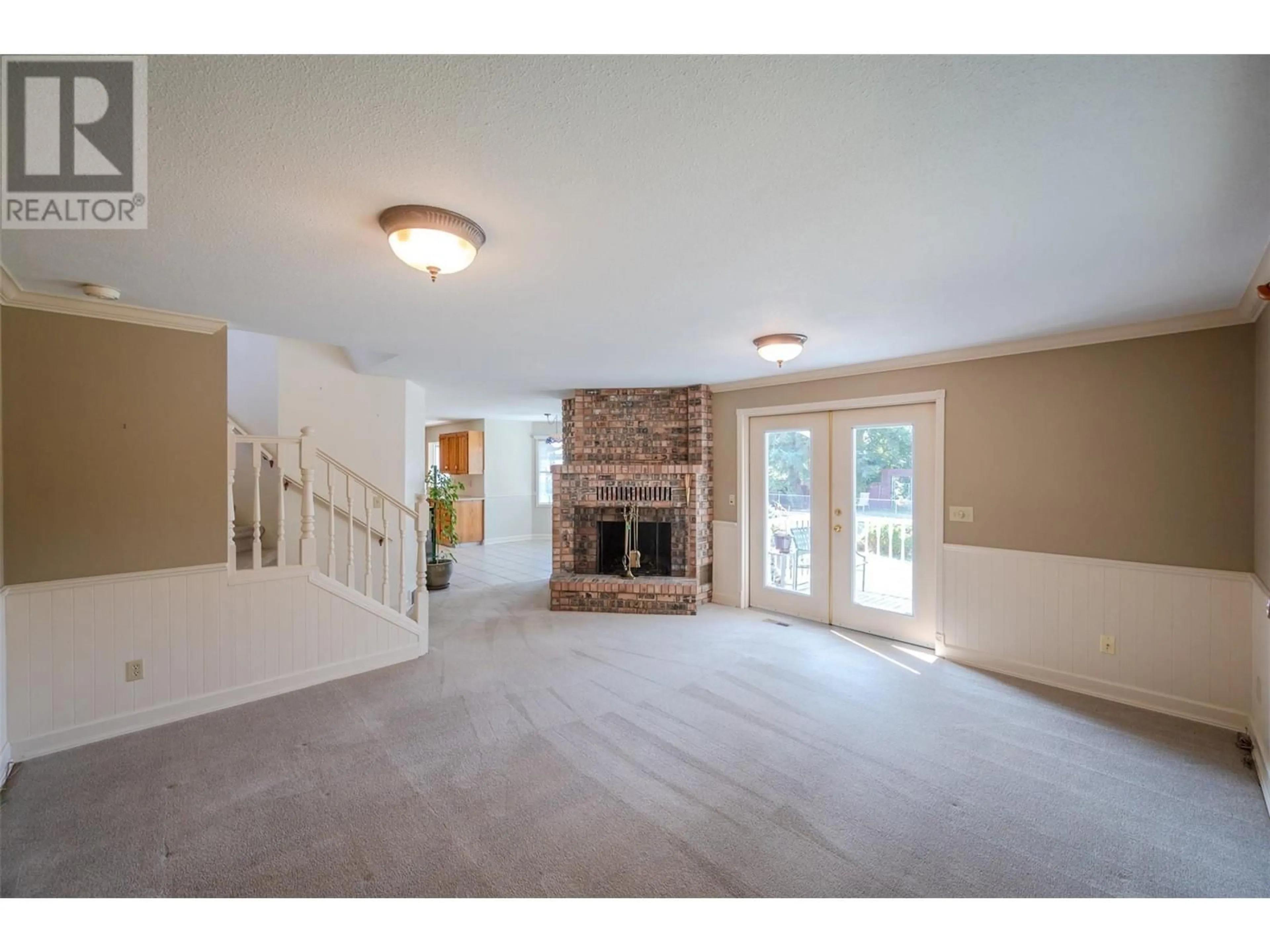 Living room, carpet floors for 12021 JONES FLAT Road, Summerland British Columbia V0H1Z0