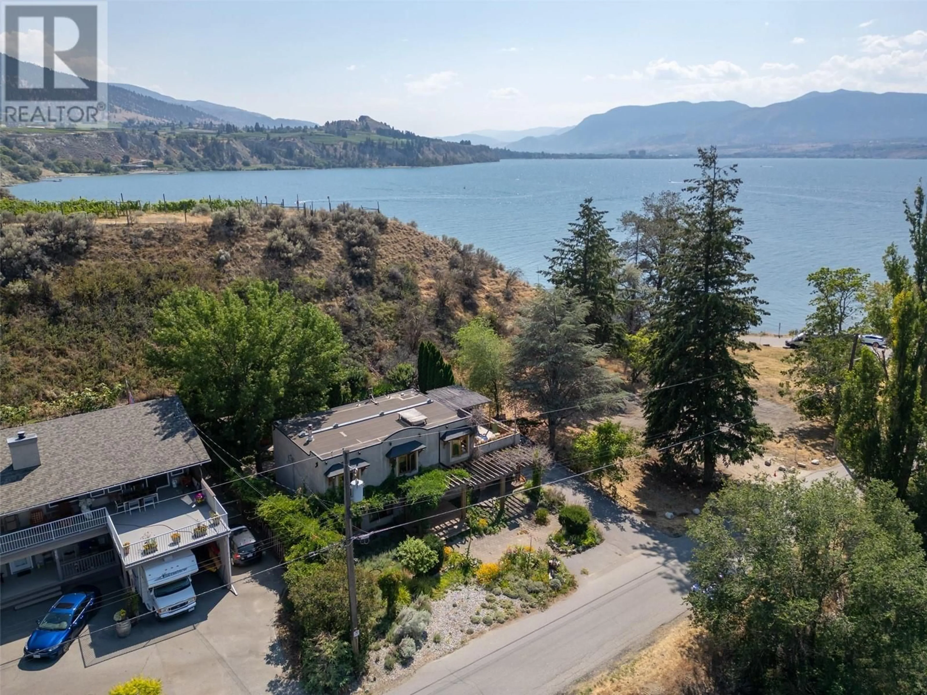 A pic from exterior of the house or condo, lake for 830 Three Mile Road, Penticton British Columbia V2A8T7