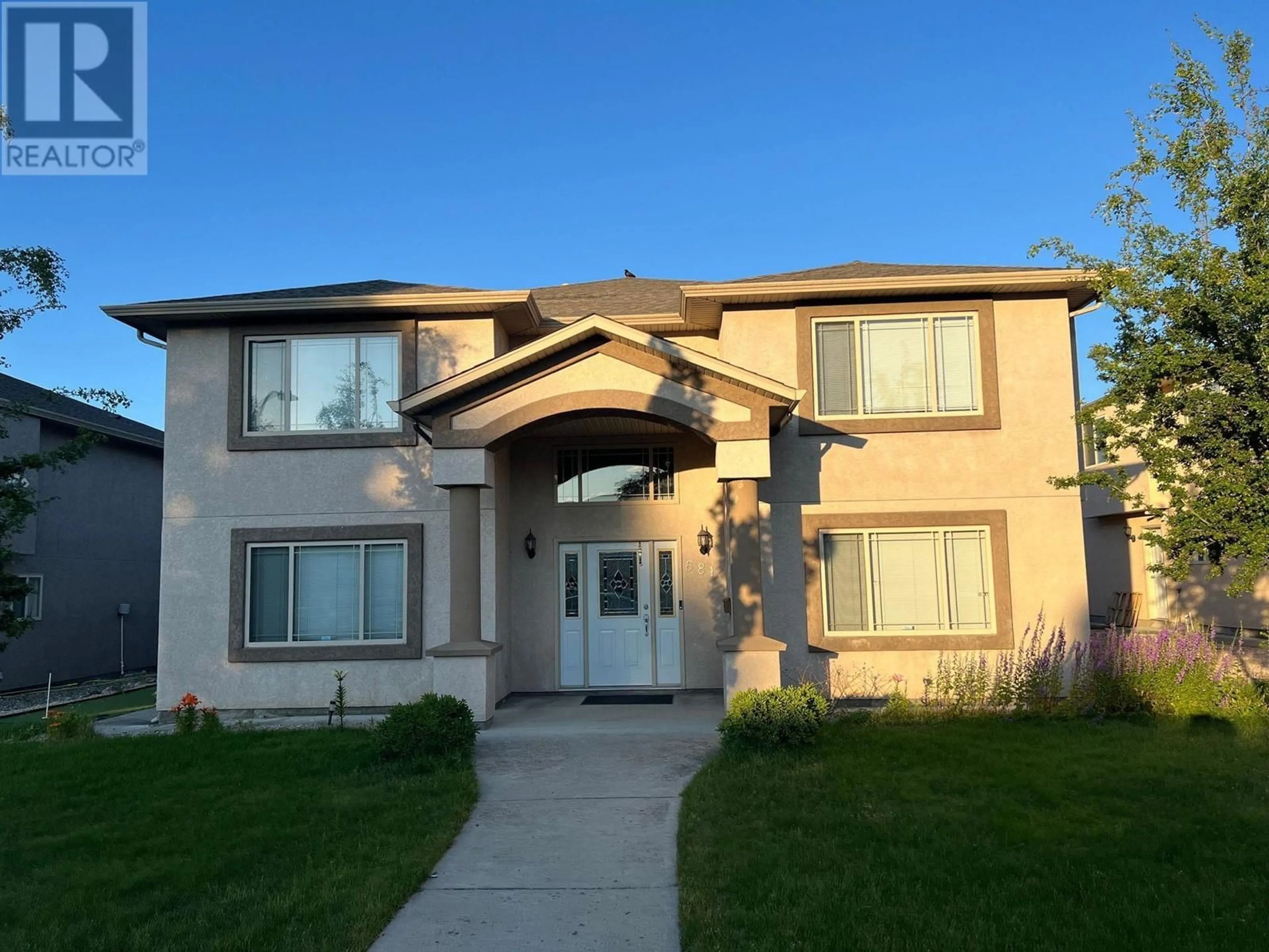 Frontside or backside of a home, the street view for 681 Renshaw Road, Kelowna British Columbia V1X6B6