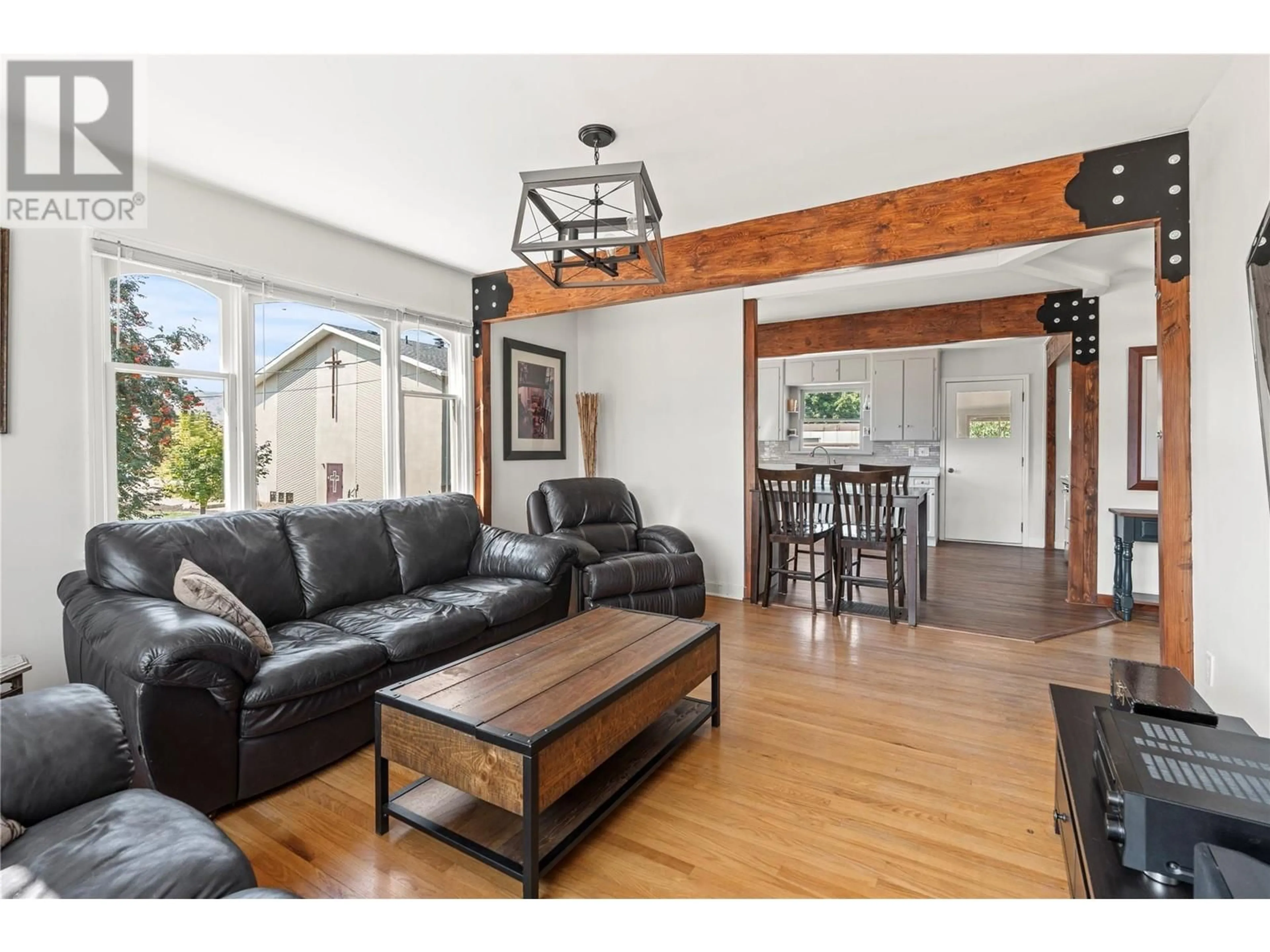 Living room, wood floors for 4957 Silver Star Road, Vernon British Columbia V1B3K3