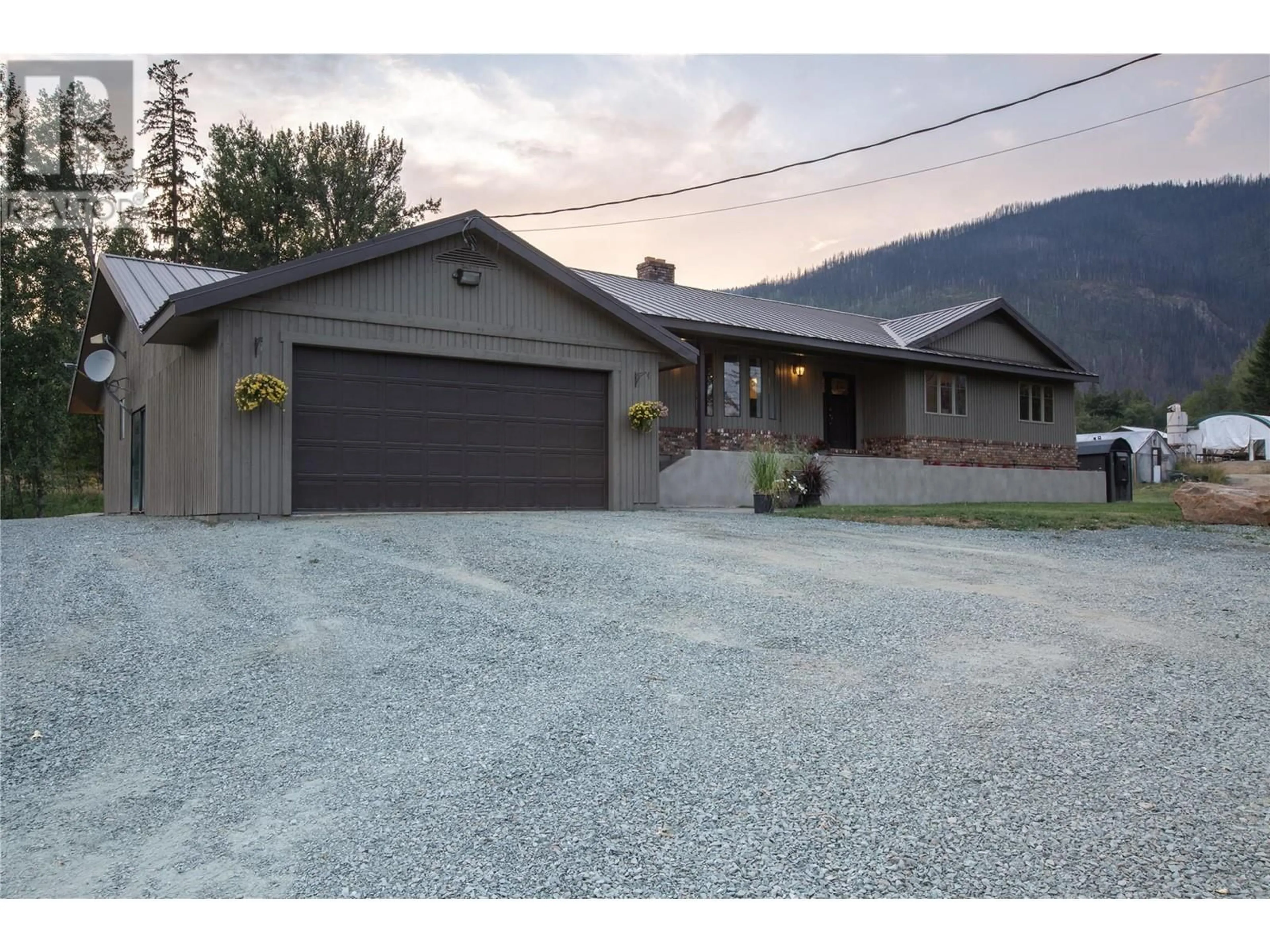 Frontside or backside of a home, the street view for 2523 Evans Road, Celista British Columbia V0E1M6