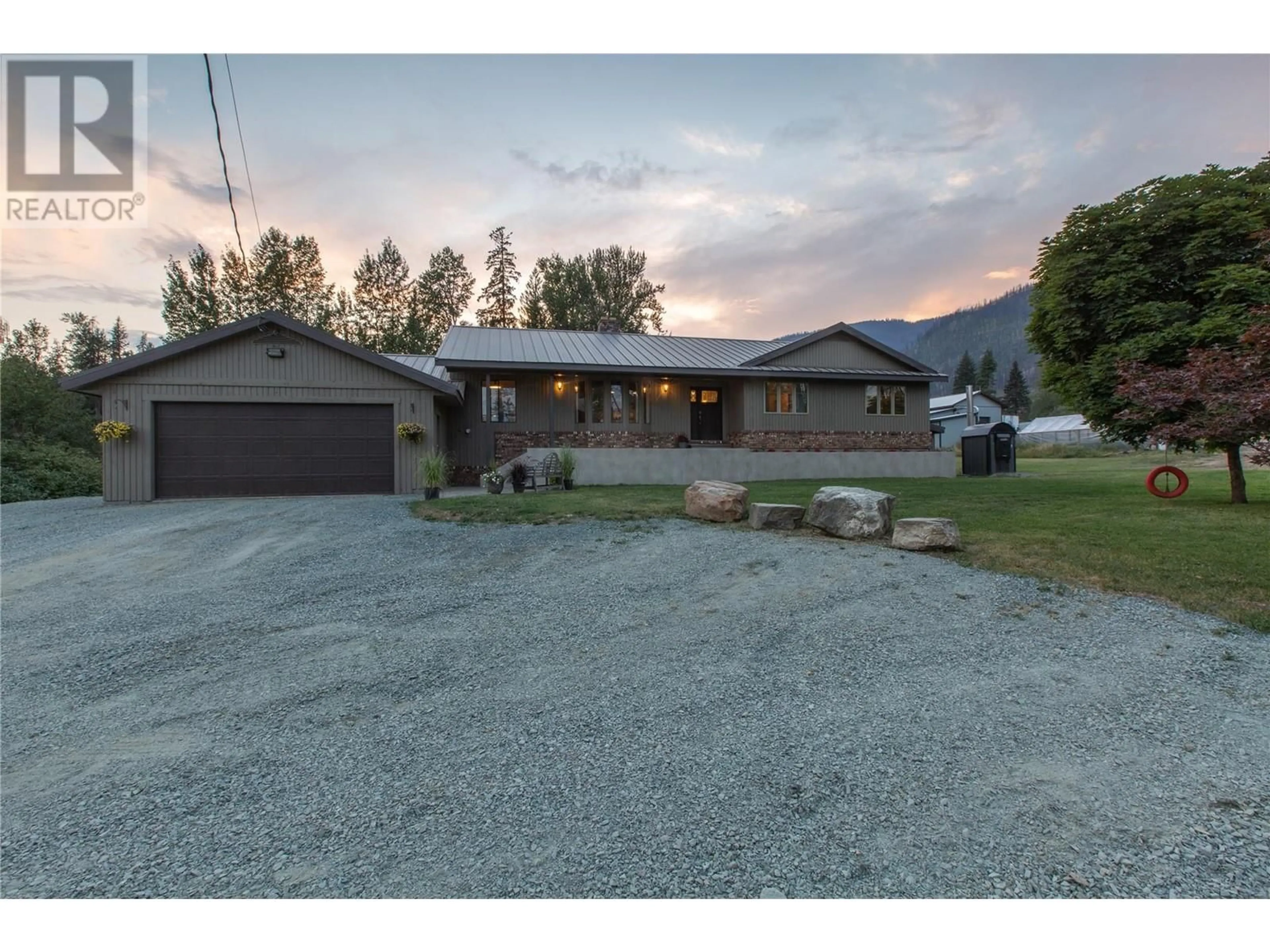 Frontside or backside of a home, the street view for 2523 Evans Road, Celista British Columbia V0E1M6