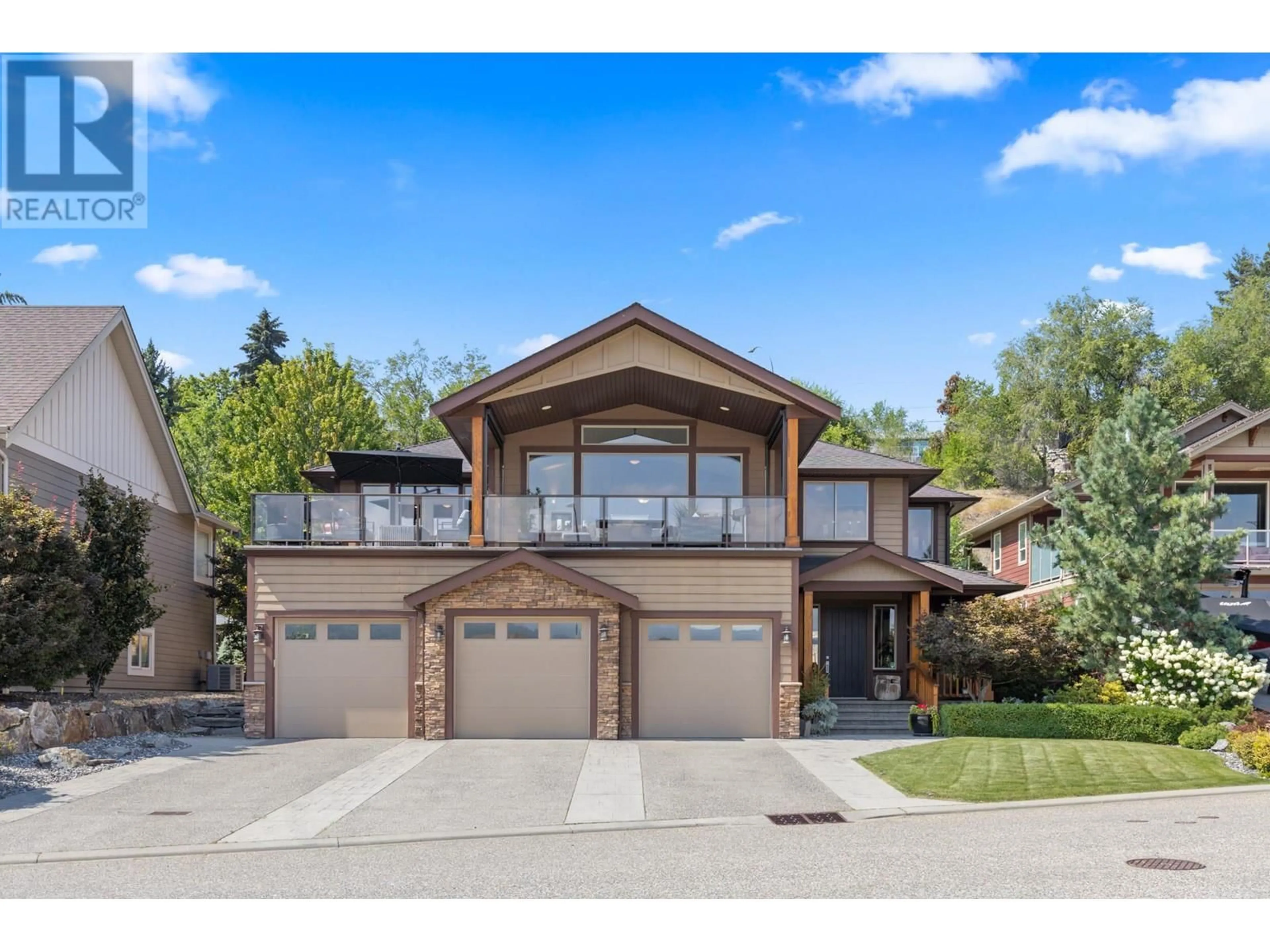 Frontside or backside of a home, the street view for 8723 Hofer Drive, Coldstream British Columbia V1B1Y8