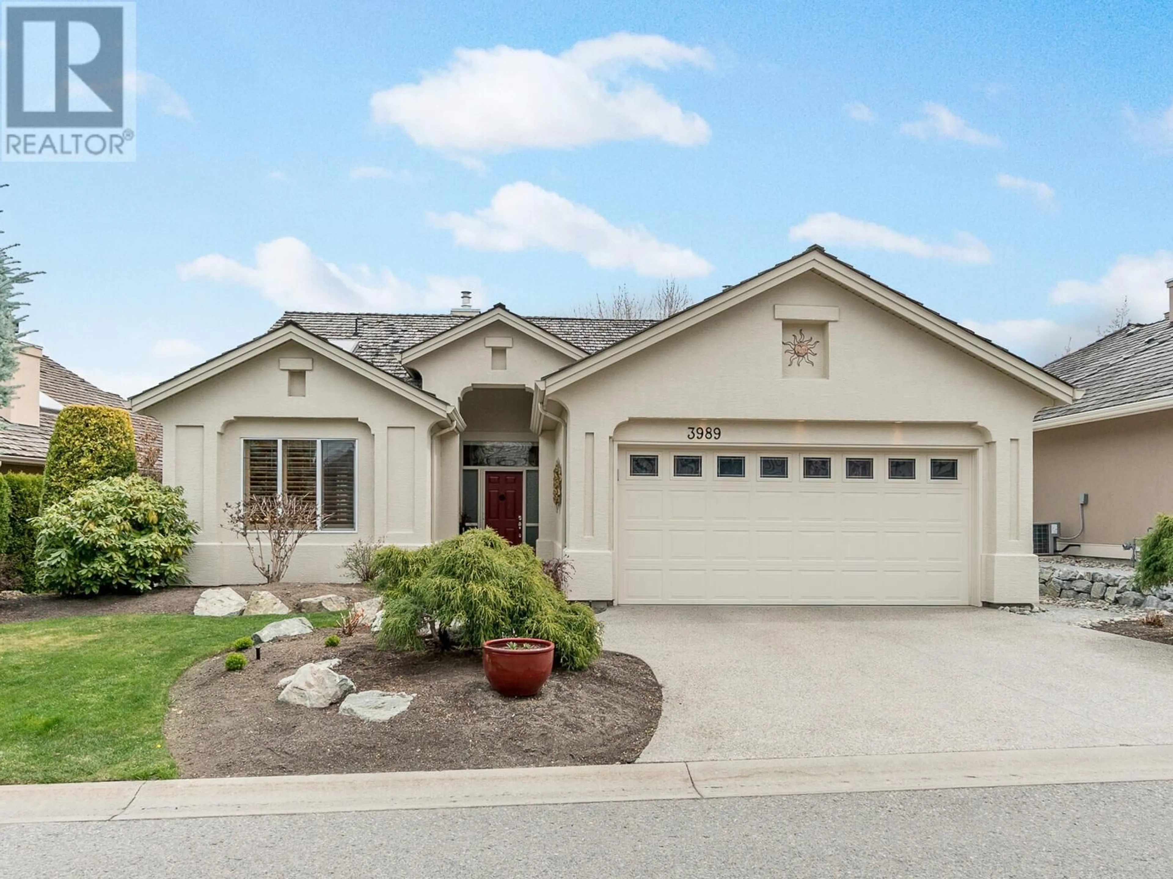 Frontside or backside of a home, the street view for 3989 Gallaghers Parkland Drive, Kelowna British Columbia V1W3Z8