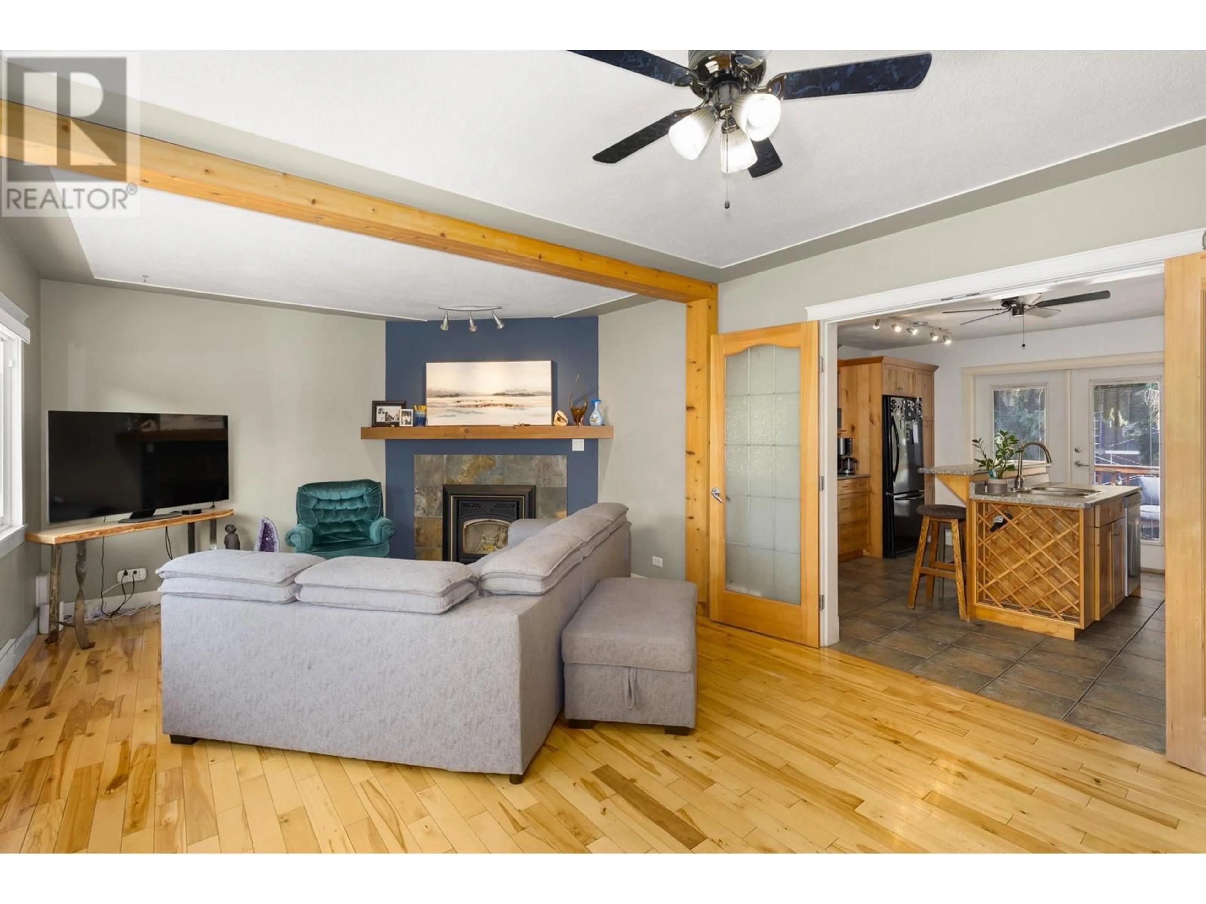 Living room, wood floors for 8407 Postill Drive, Coldstream British Columbia V1B1T9