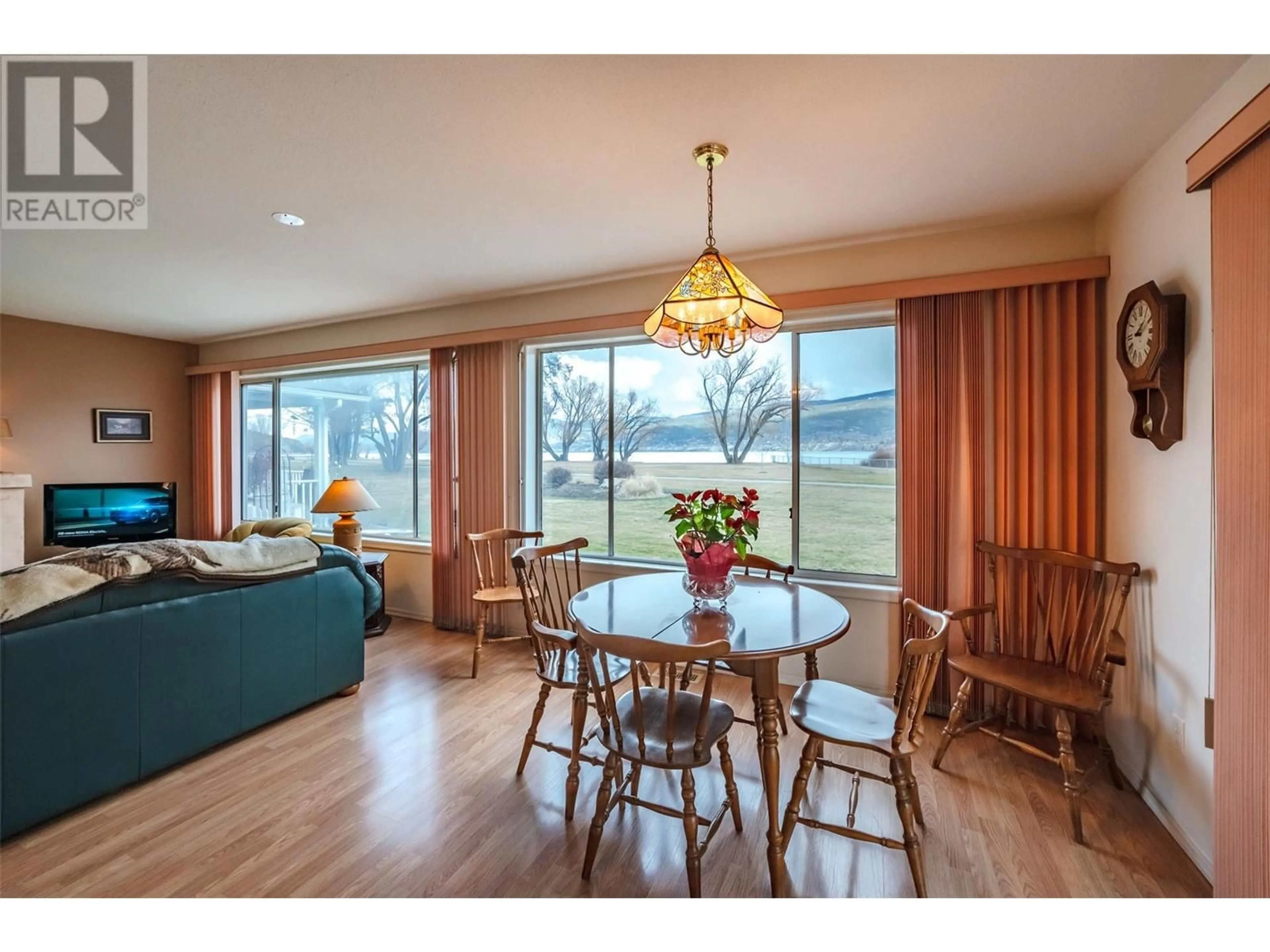 Dining room, wood/laminate floor for 45 Kingfisher Drive, Penticton British Columbia V2A8K6