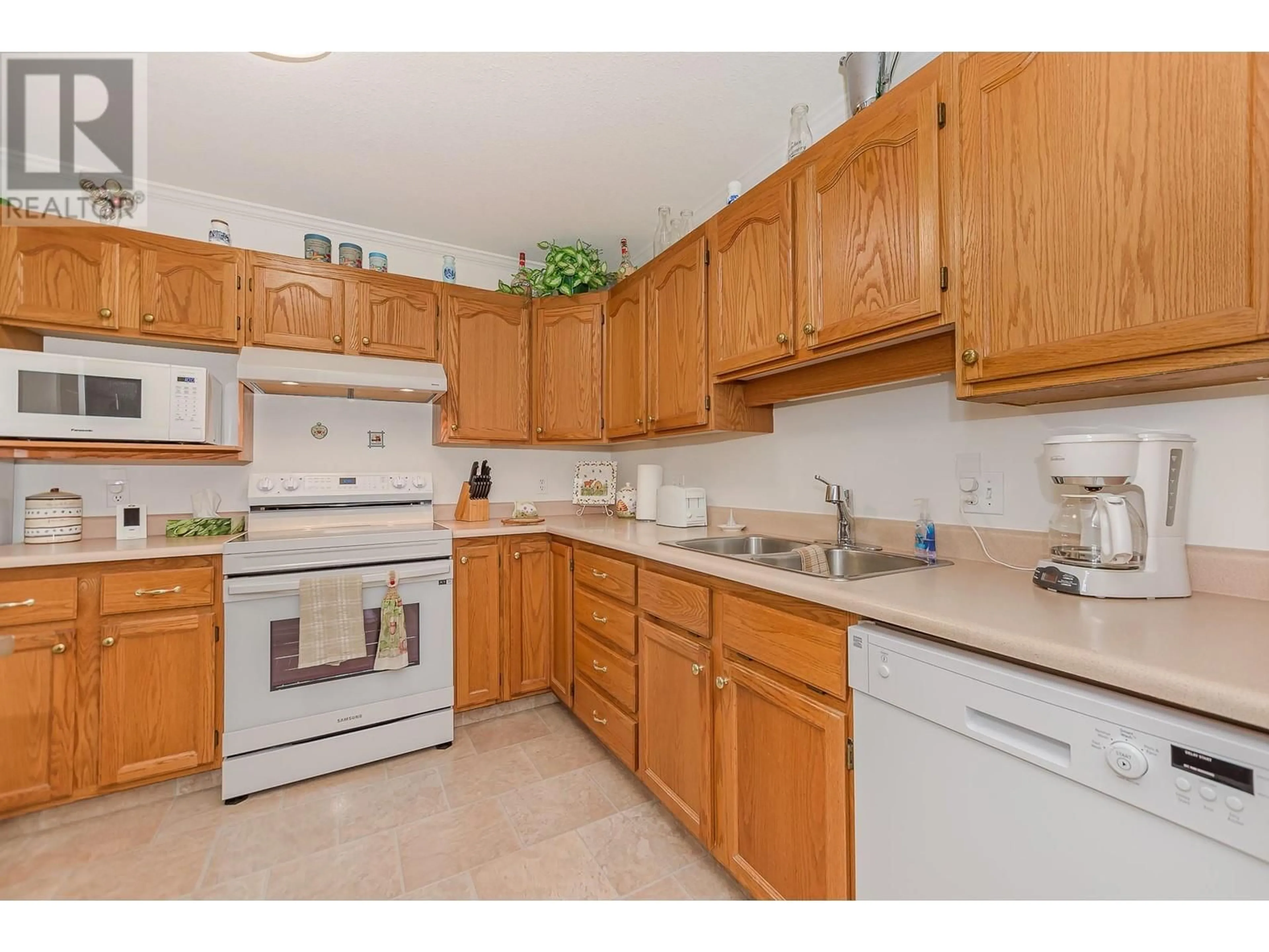 Standard kitchen, wood floors, cottage for 251 6 Street SE Unit# 107, Salmon Arm British Columbia V1E1J9