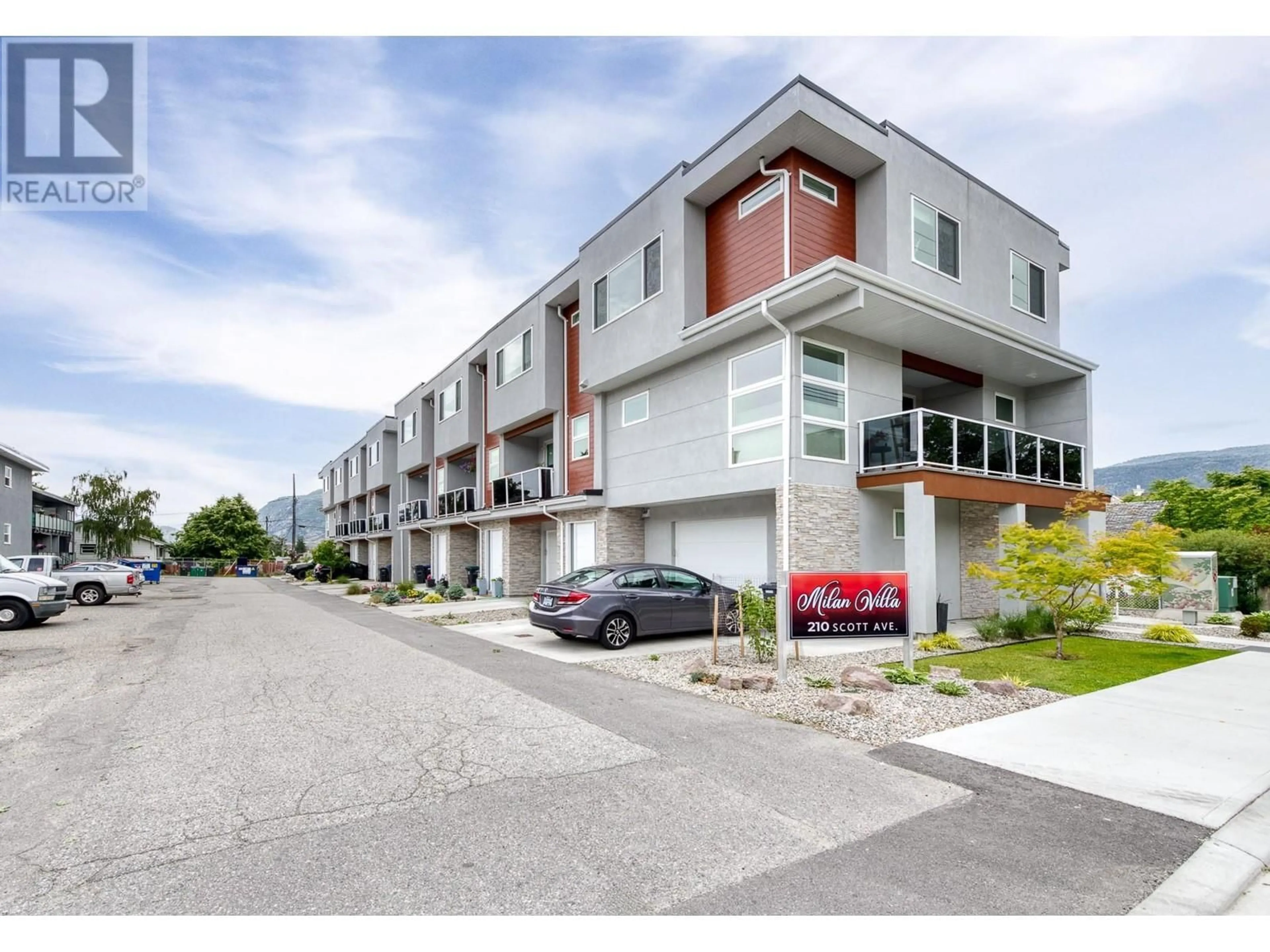 A pic from exterior of the house or condo, the street view for 210 Scott Avenue Unit# 102, Penticton British Columbia V2A2J5