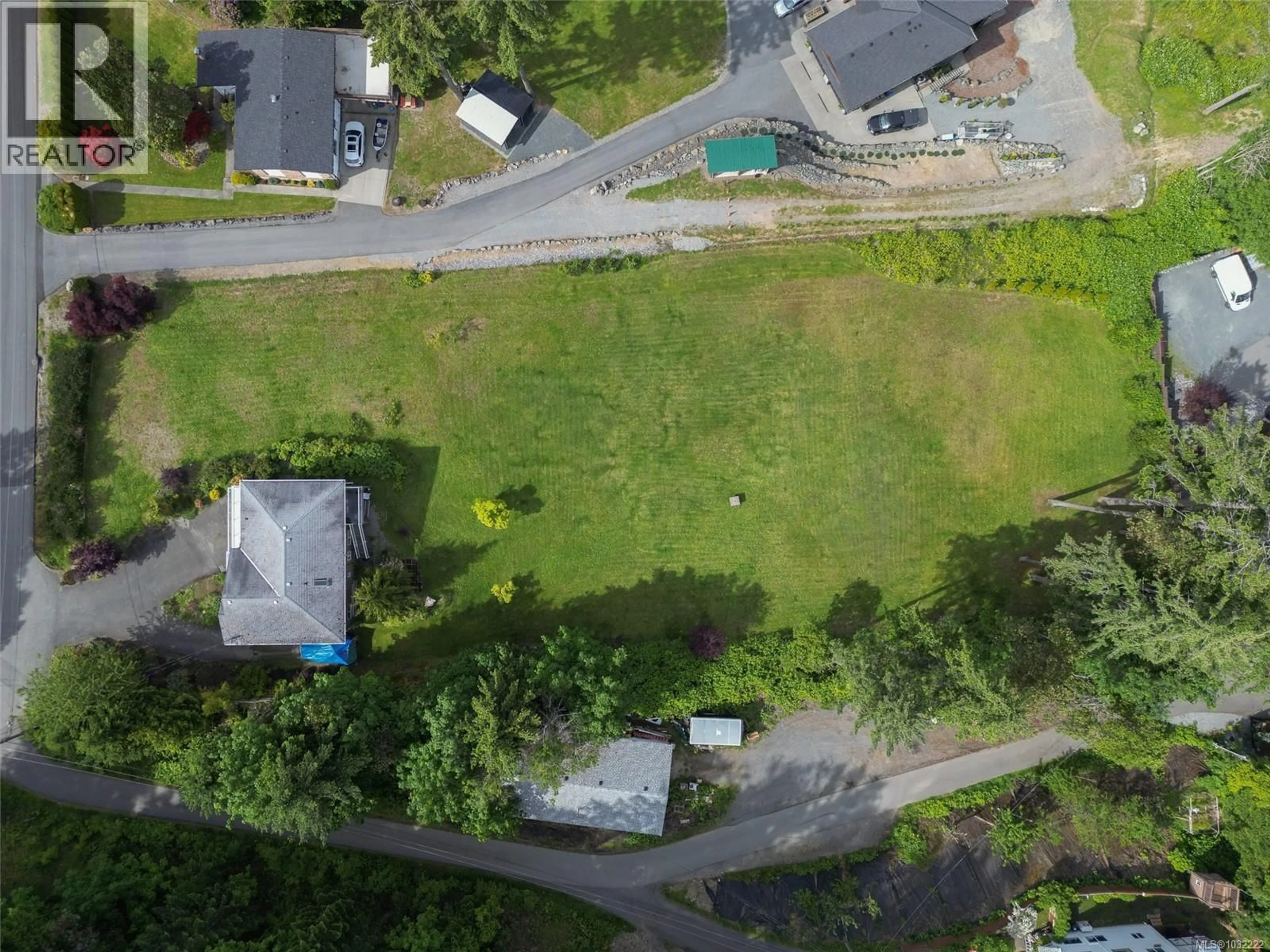 A pic from outside/outdoor area/front of a property/back of a property/a pic from drone, street for 256 KING ROAD, Nanaimo British Columbia V9R6H9