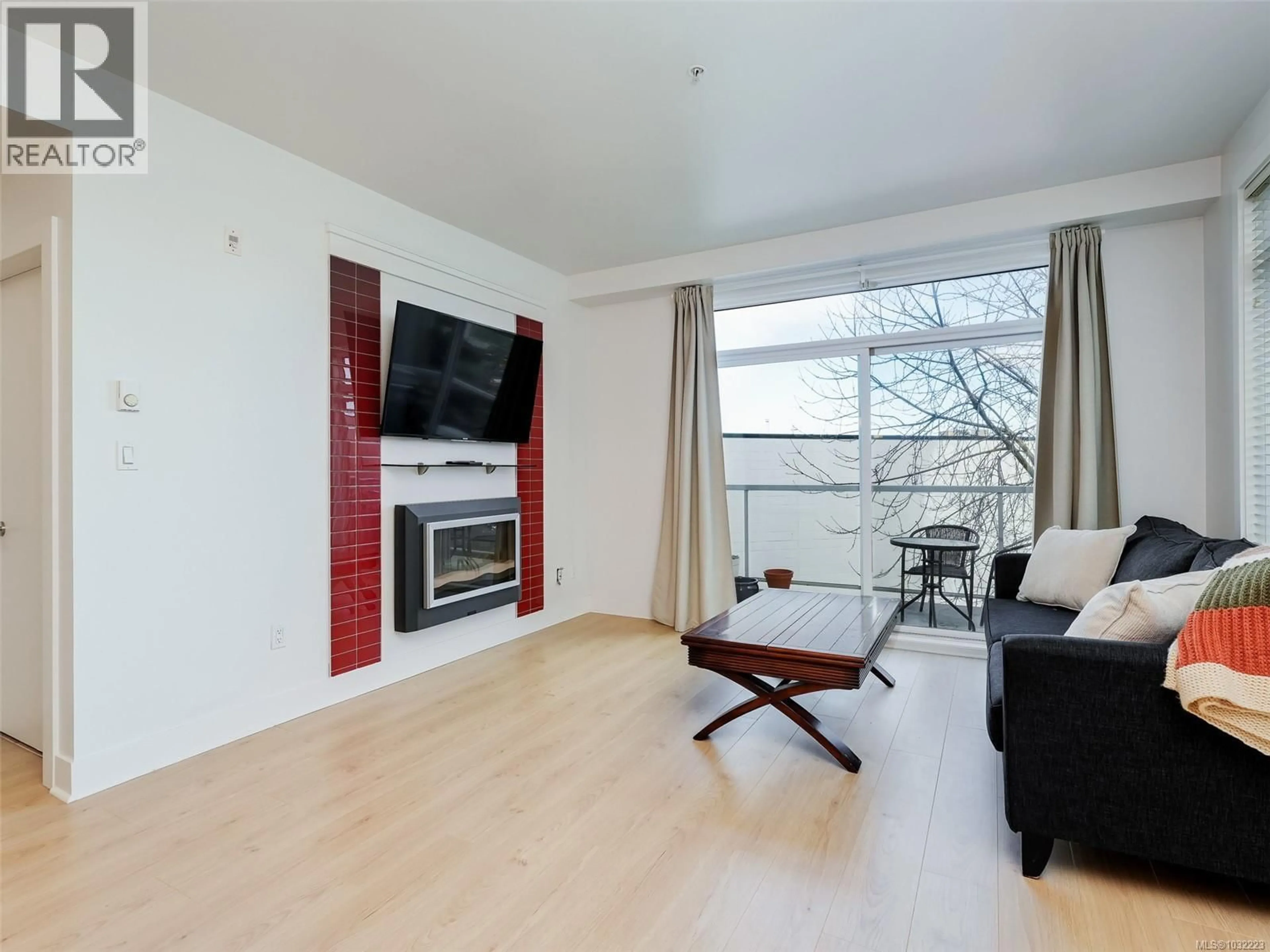 Living room with furniture, wood/laminate floor for 305 - 606 SPEED AVENUE, Victoria British Columbia V8Z1A4