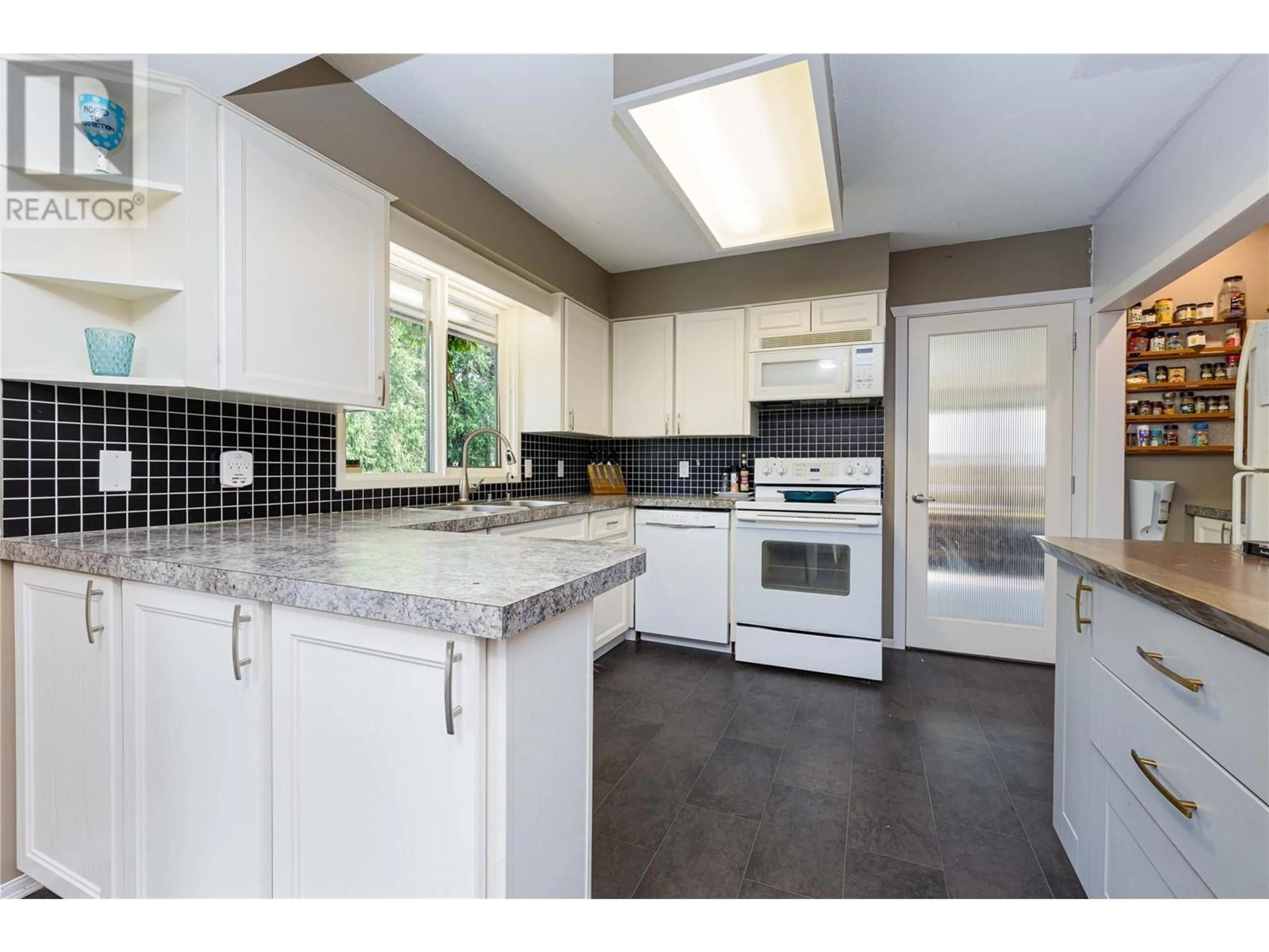 Kitchen, wood floors, cottage for 2539 Forest Drive, Blind Bay British Columbia V0E1H2