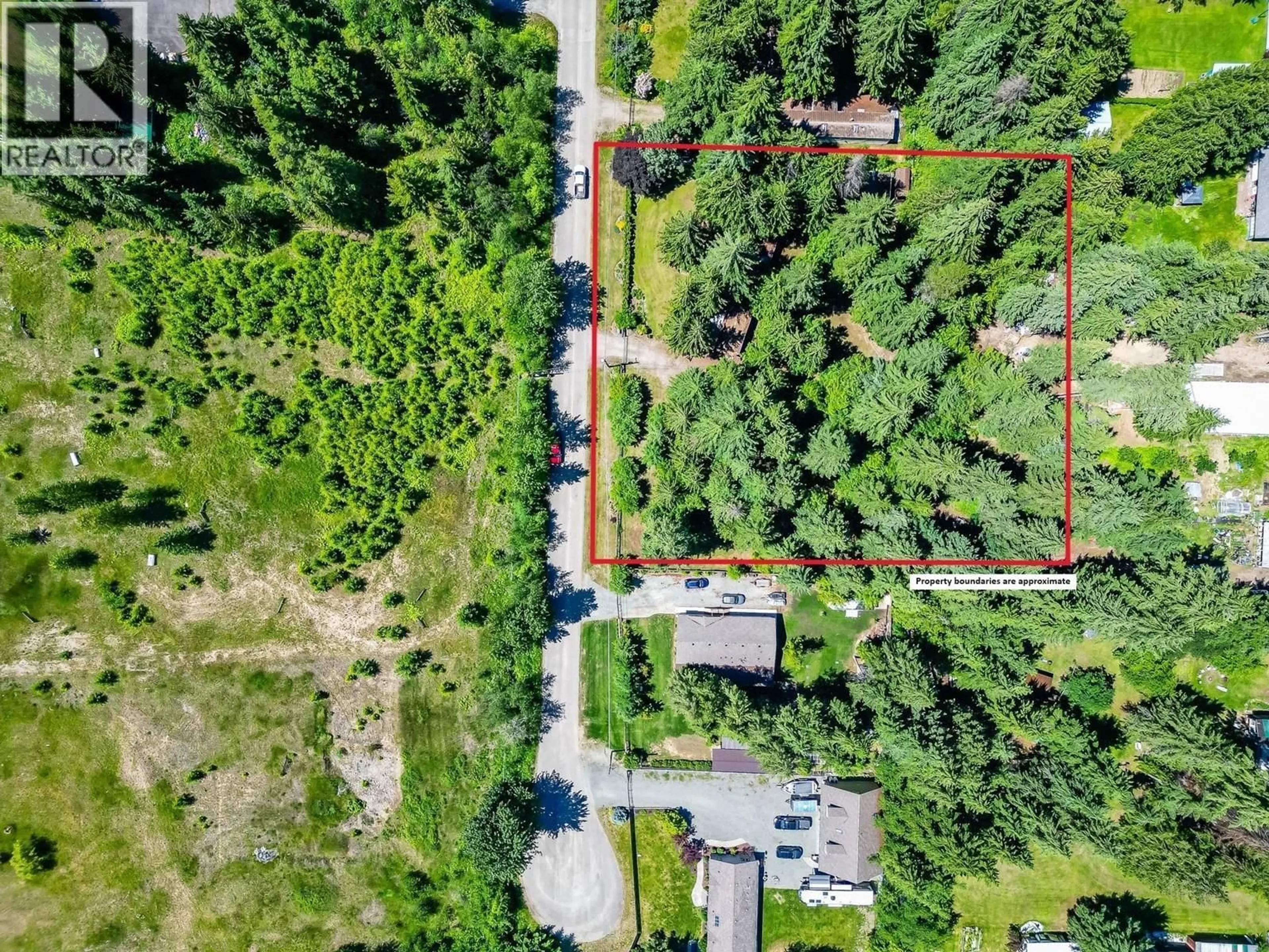 A pic from outside/outdoor area/front of a property/back of a property/a pic from drone, forest/trees view for SANTA ROAD, Scotch Creek British Columbia V0E1M5