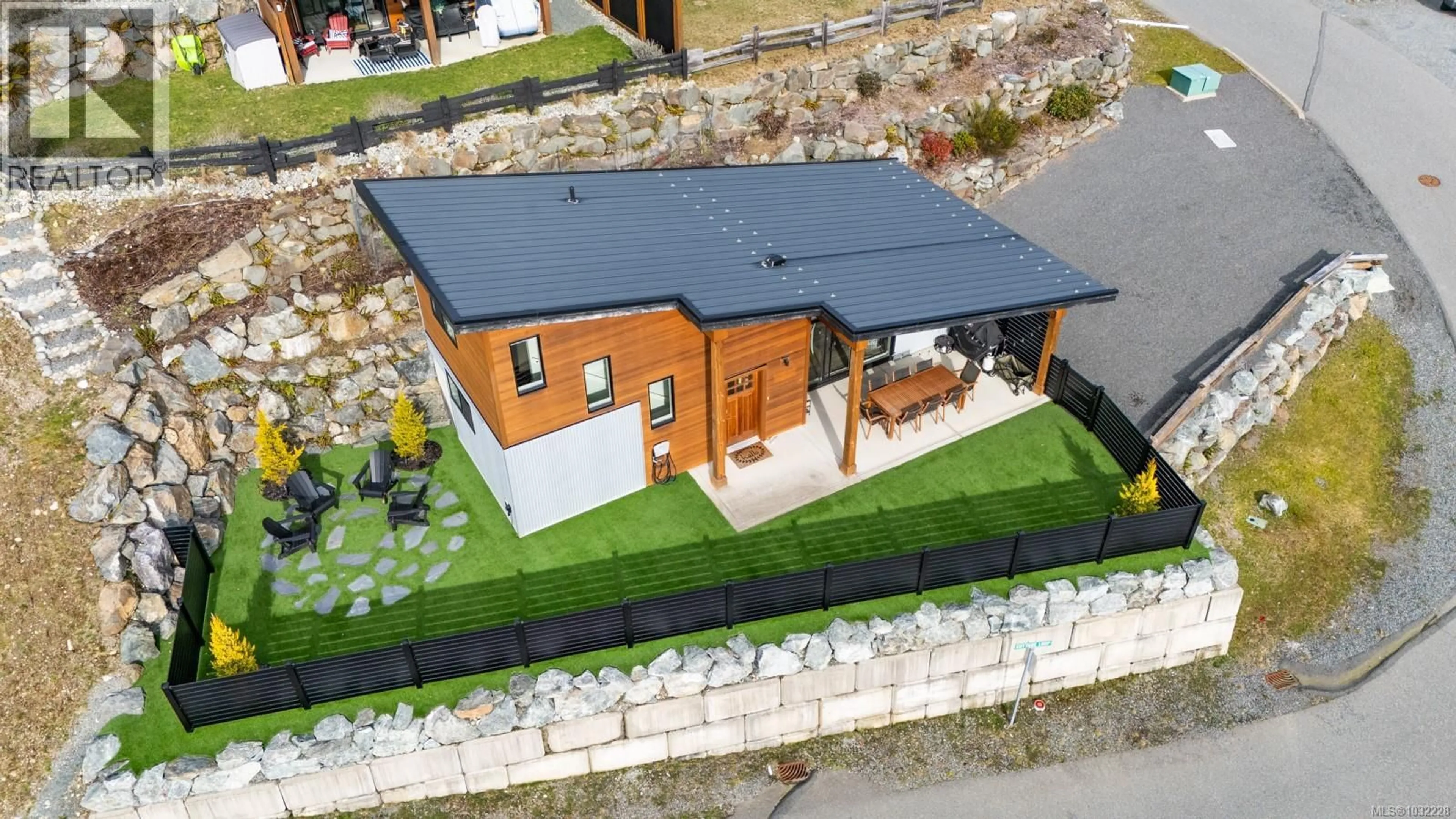 A pic from outside/outdoor area/front of a property/back of a property/a pic from drone, building for 7405 COTTAGE WAY, Lake Cowichan British Columbia V0R2G1