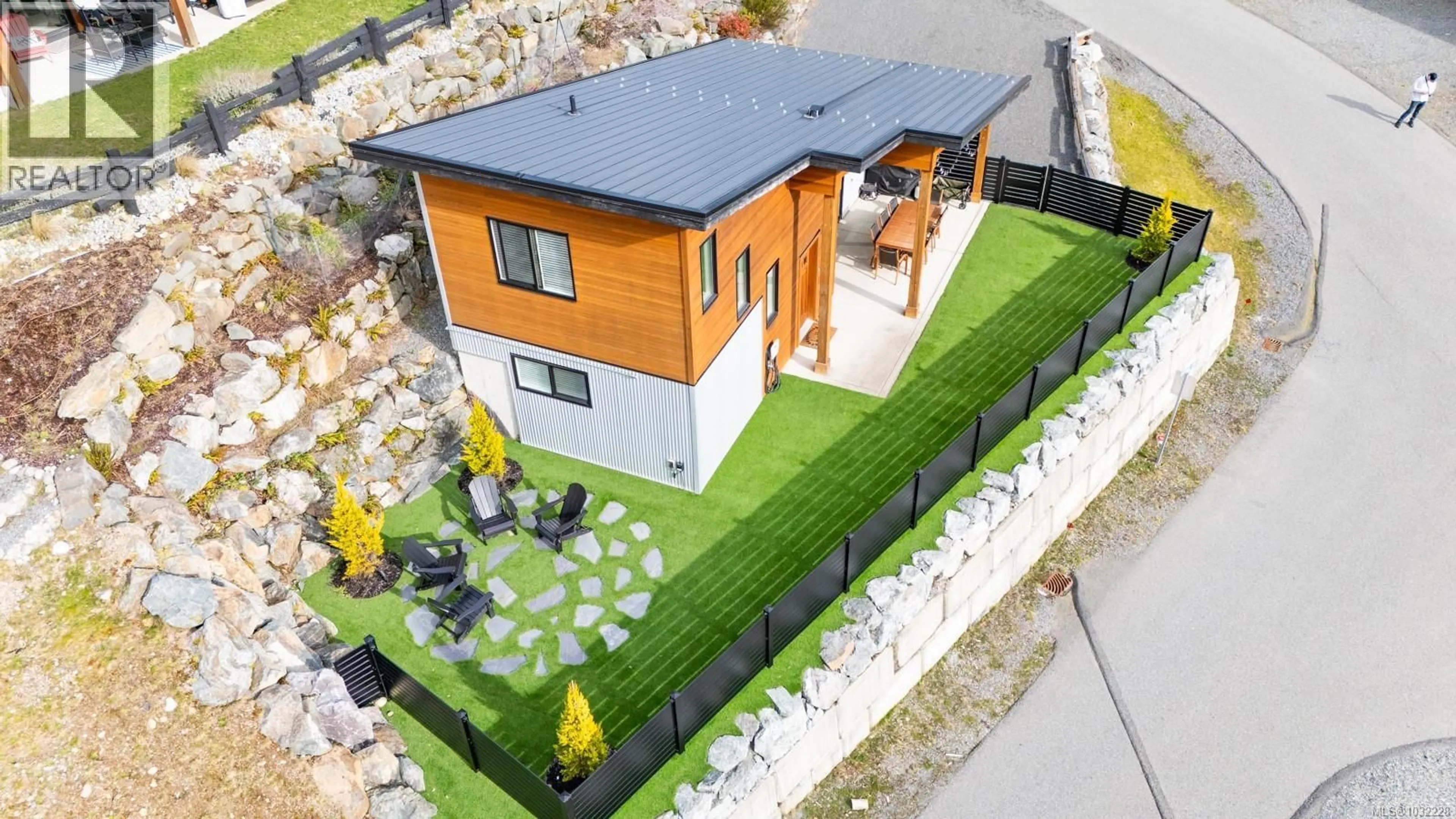 A pic from outside/outdoor area/front of a property/back of a property/a pic from drone, street for 7405 COTTAGE WAY, Lake Cowichan British Columbia V0R2G1