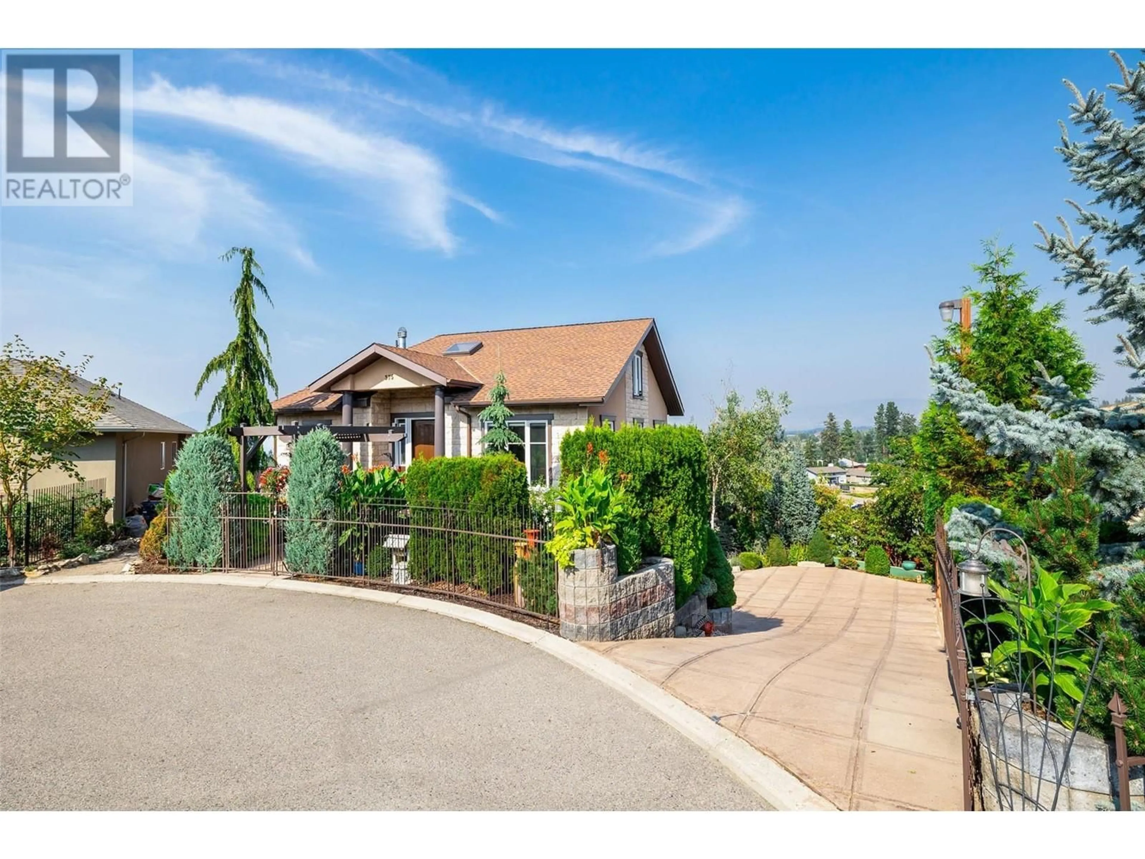 Frontside or backside of a home, cottage for 375 Trumpeter Court, Kelowna British Columbia V1W5J4