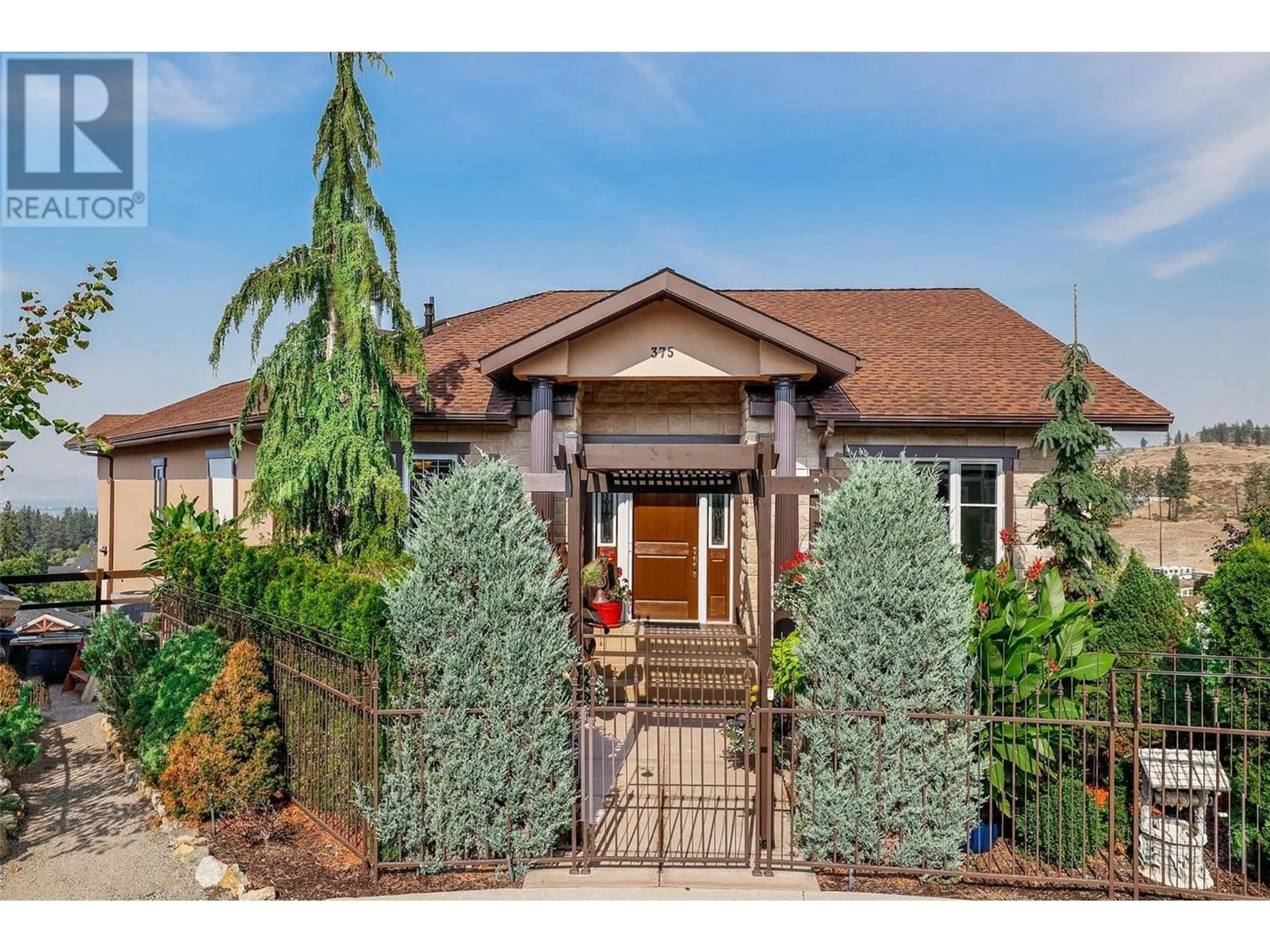 Frontside or backside of a home, cottage for 375 Trumpeter Court, Kelowna British Columbia V1W5J4