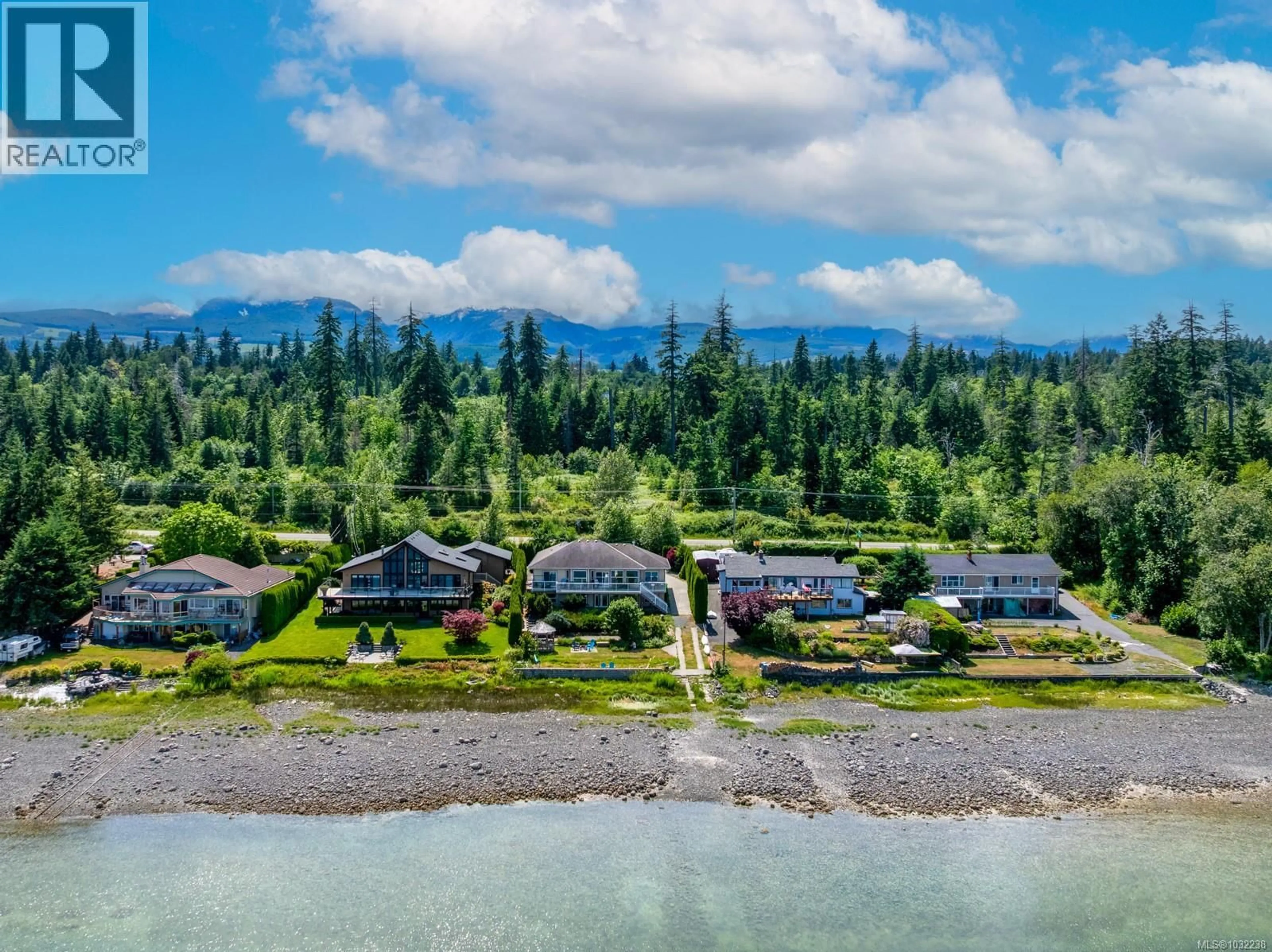 A pic from outside/outdoor area/front of a property/back of a property/a pic from drone, water/lake/river/ocean view for 6800 BUCKLEY BAY FRONTAGE ROAD, Fanny Bay British Columbia V0R1W0