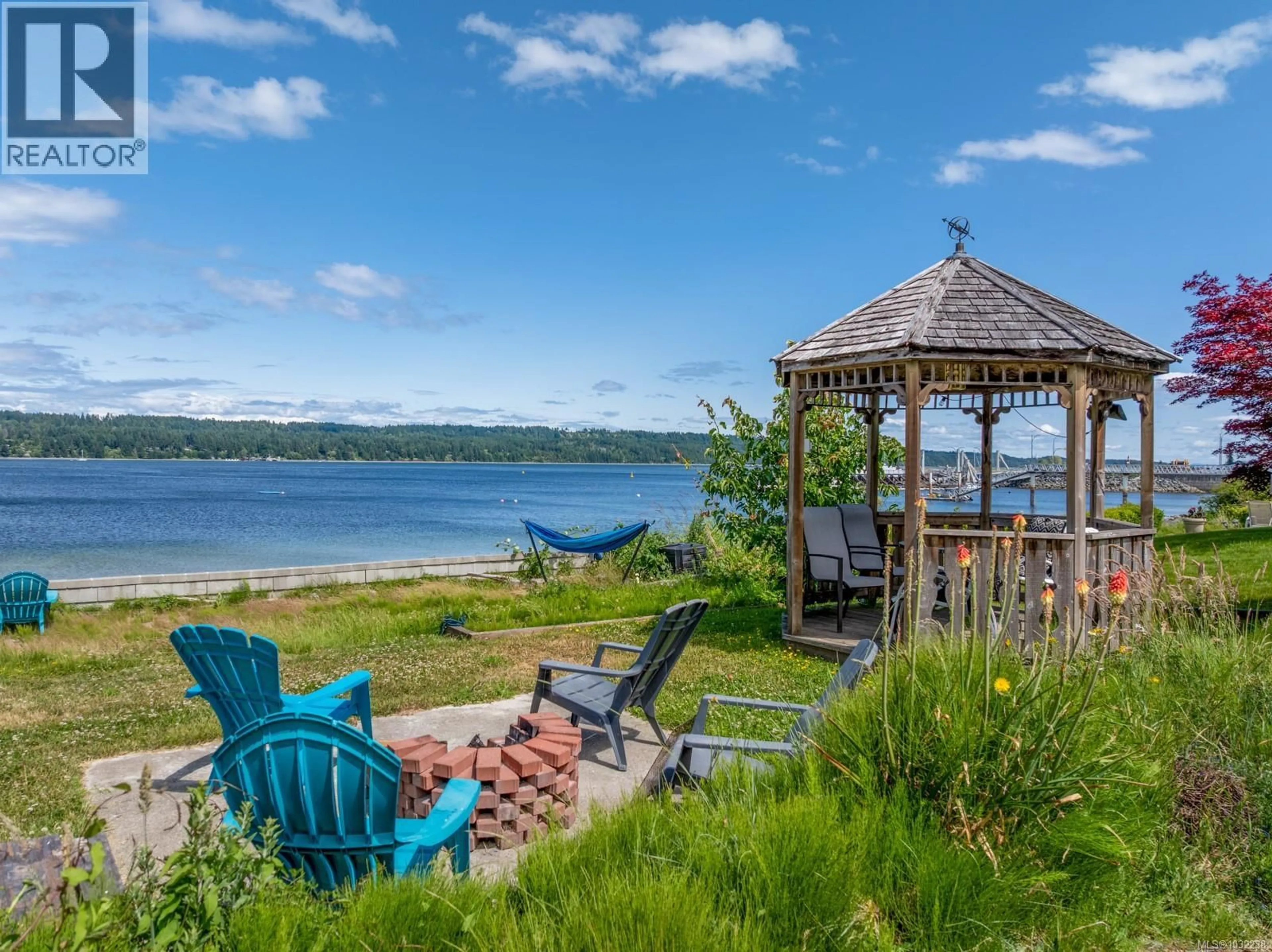 Patio, water/lake/river/ocean view for 6800 BUCKLEY BAY FRONTAGE ROAD, Fanny Bay British Columbia V0R1W0