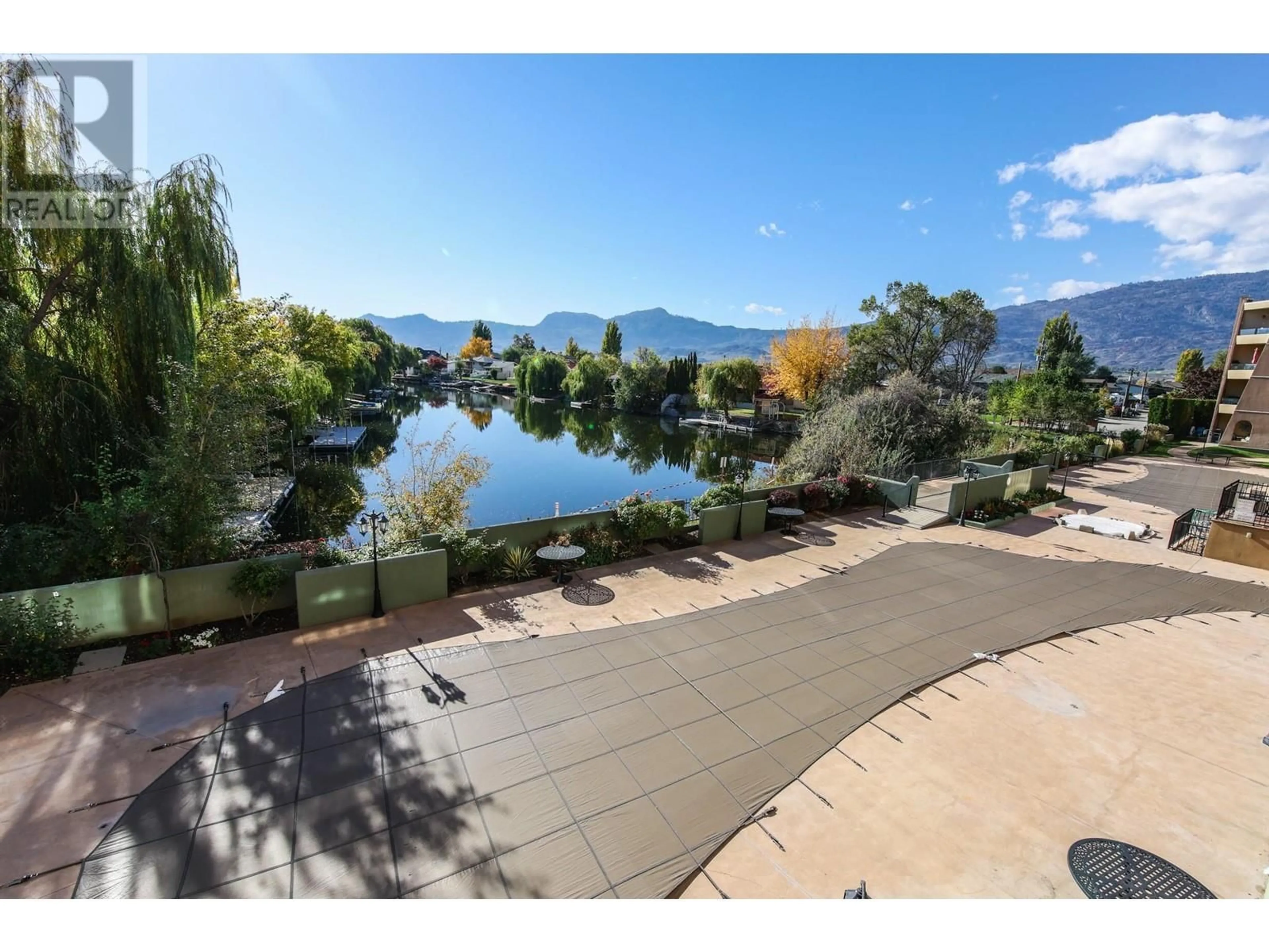 A pic from outside/outdoor area/front of a property/back of a property/a pic from drone, water/lake/river/ocean view for 204 - 15 SOLANA KEY COURT, Osoyoos British Columbia V0H1V3