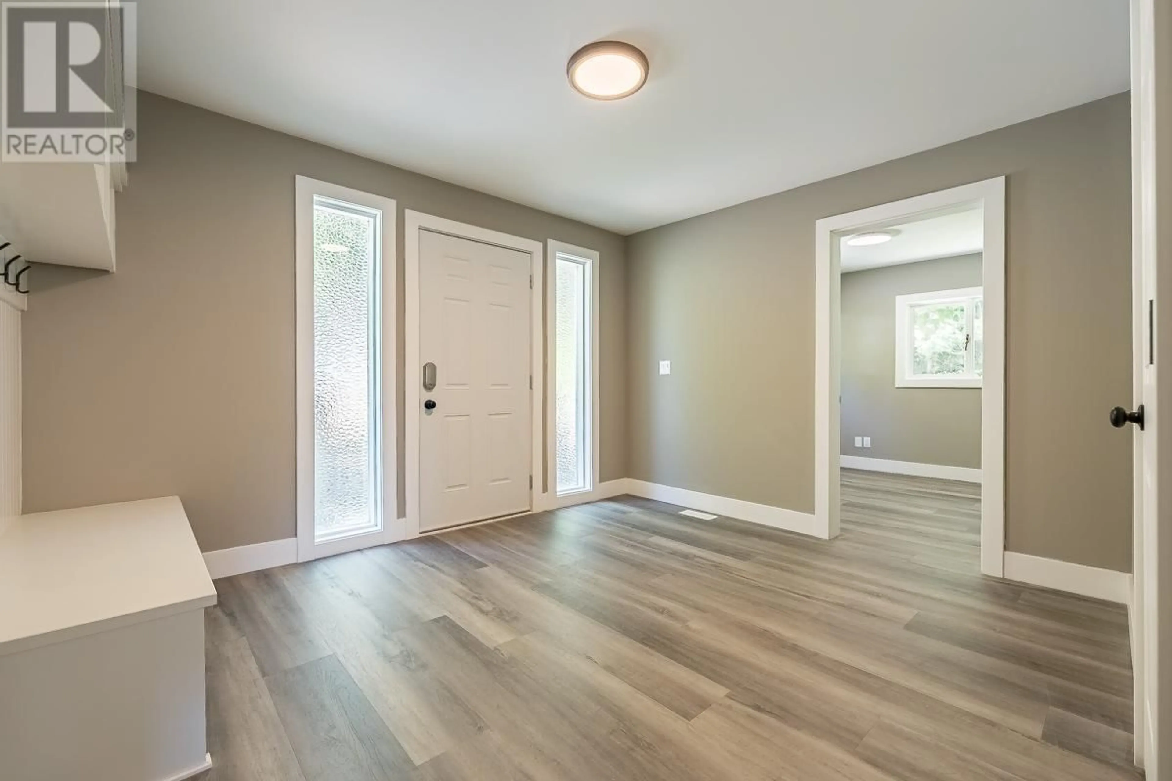 Indoor entryway, wood floors for 7430 Crowfoot Drive, Anglemont British Columbia V0E1M8