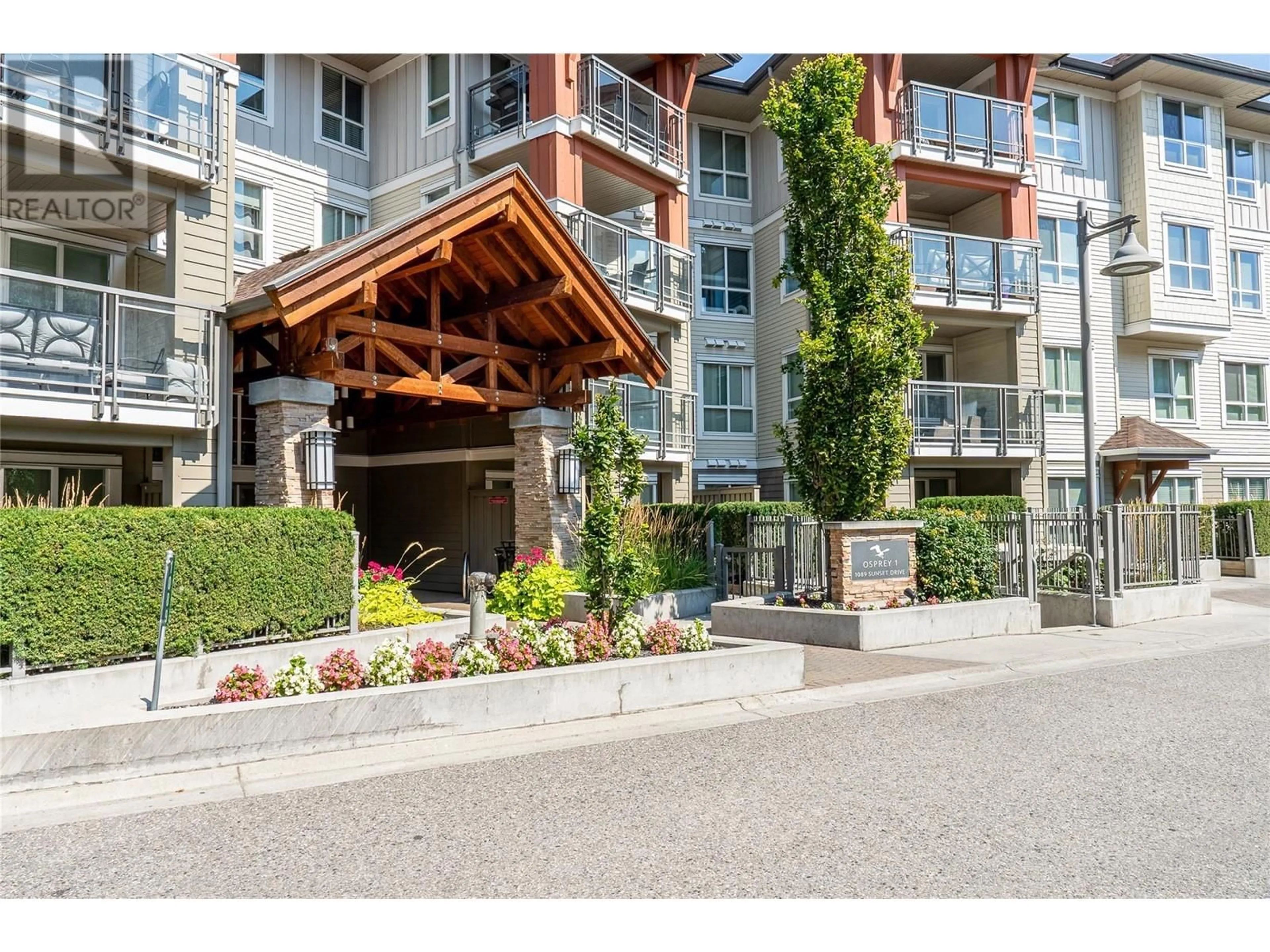 A pic from exterior of the house or condo for 1089 Sunset Drive Unit# 109, Kelowna British Columbia V1Y9Z3