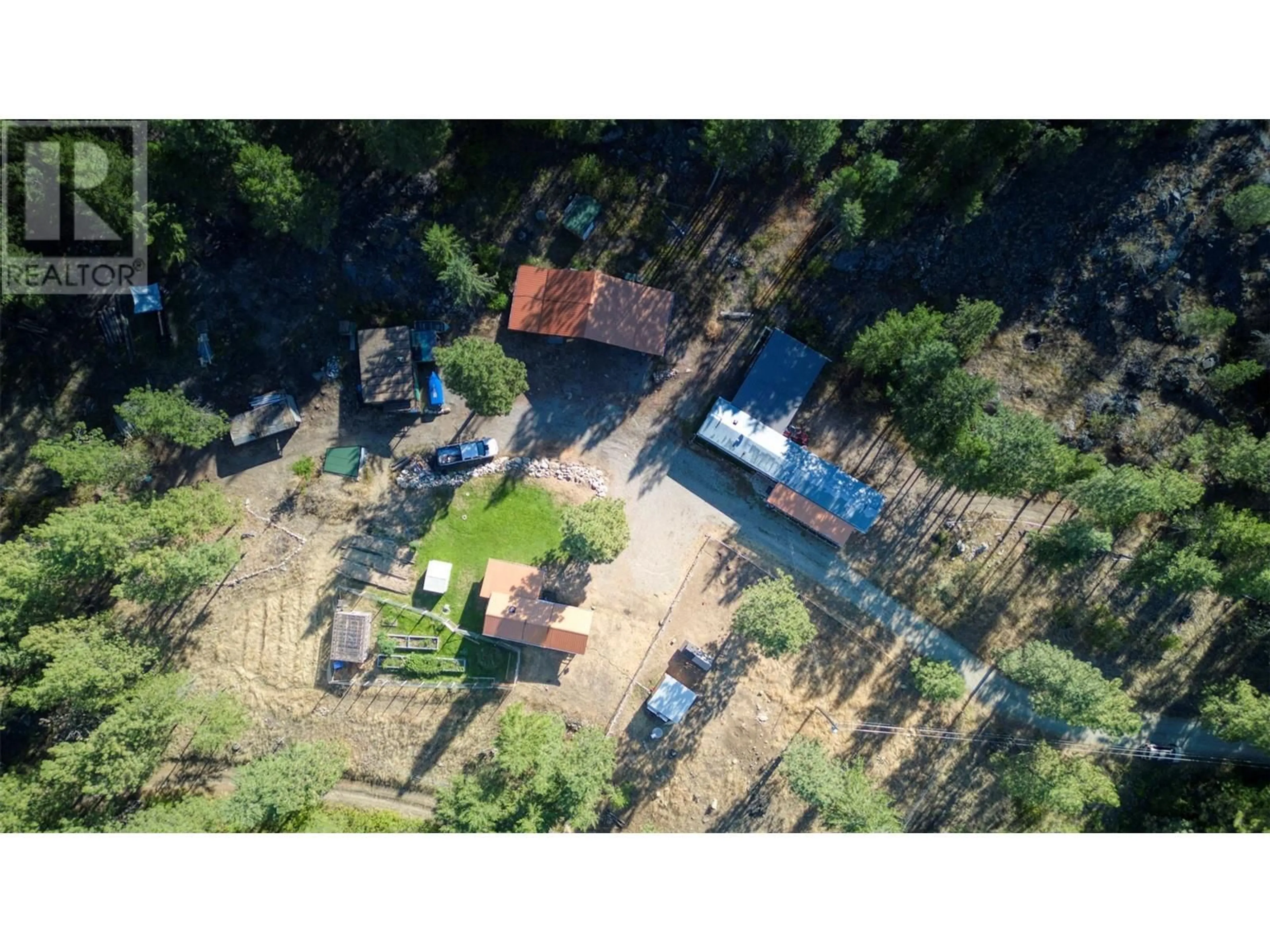 A pic from outside/outdoor area/front of a property/back of a property/a pic from drone, building for 115 ANARCHIST PLACE, Osoyoos British Columbia V0H1V0