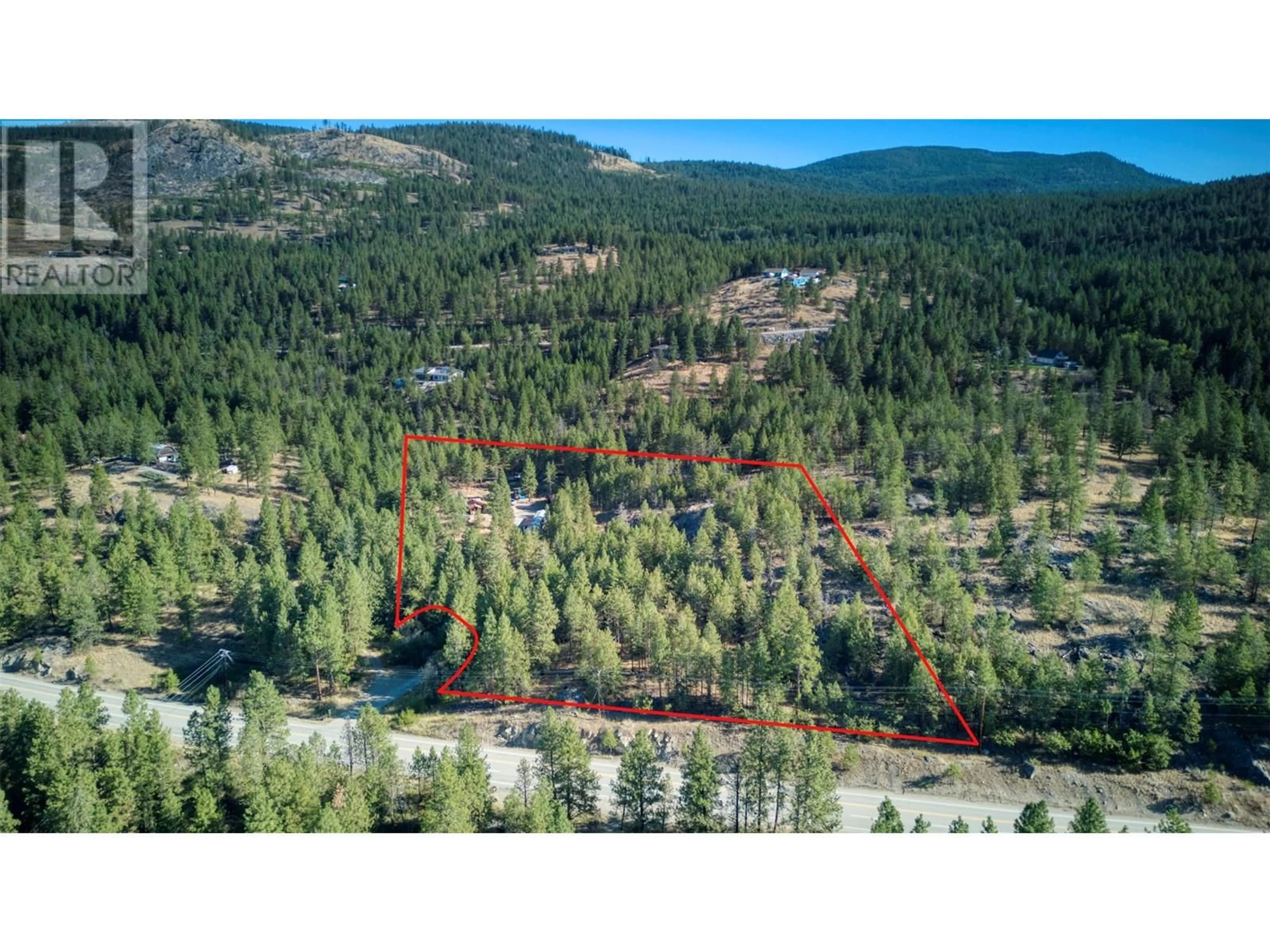 A pic from outside/outdoor area/front of a property/back of a property/a pic from drone, forest/trees view for 115 ANARCHIST PLACE, Osoyoos British Columbia V0H1V0