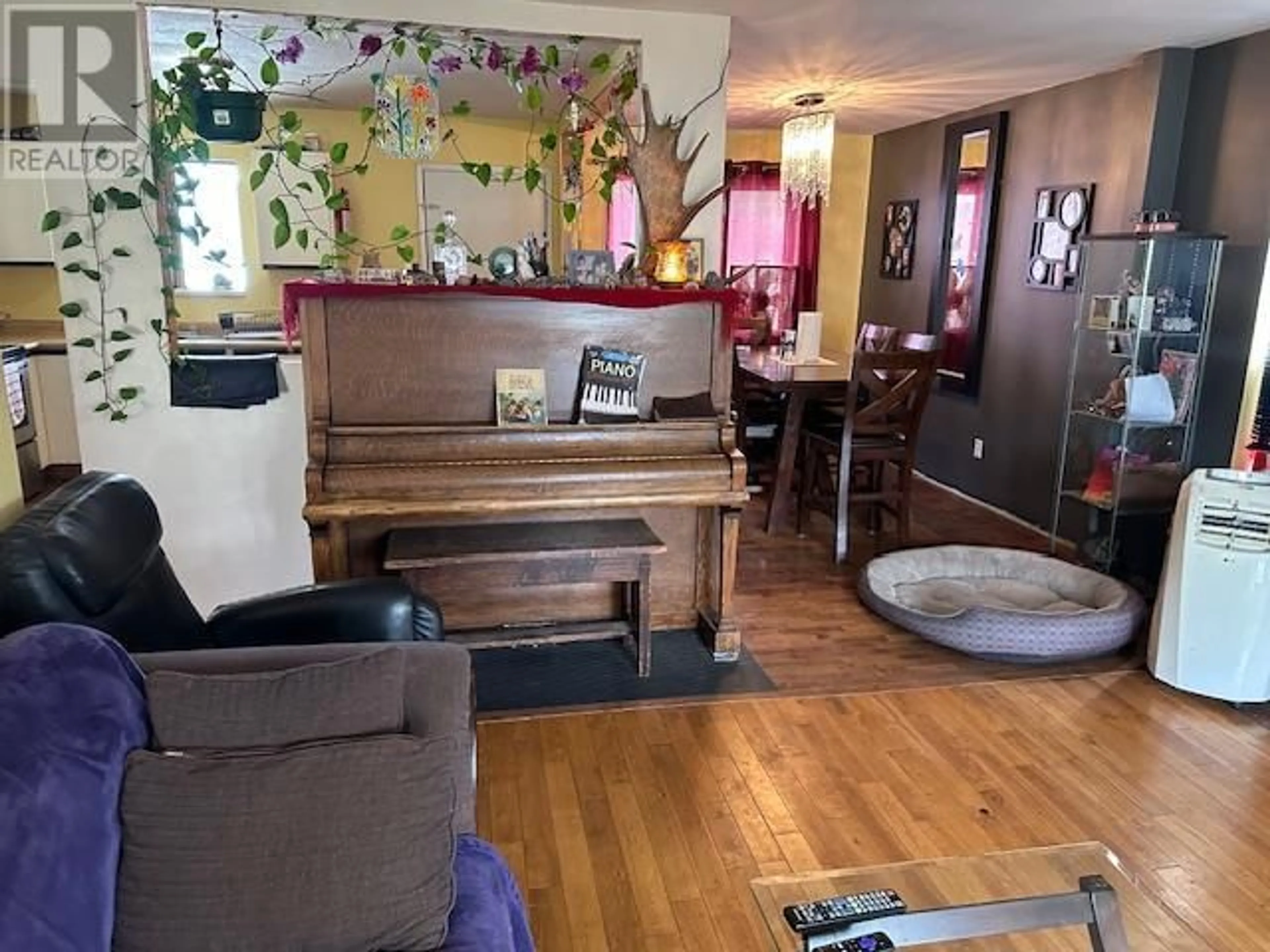 Living room, wood floors for 292 Peace River Crescent, Tumbler Ridge British Columbia V0C2W0