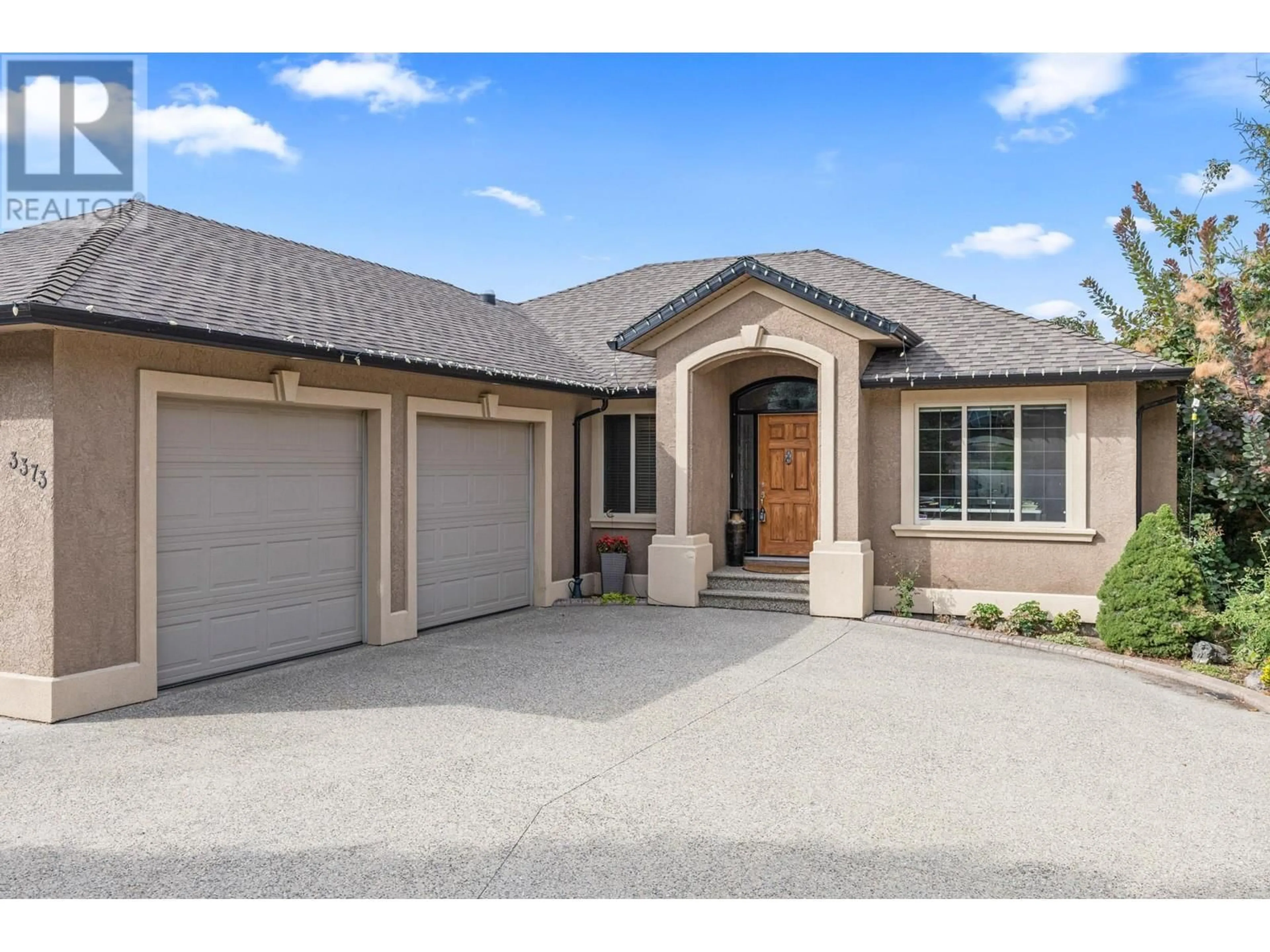 Frontside or backside of a home, the street view for 3373 Merlot Way, West Kelowna British Columbia V4T2X4