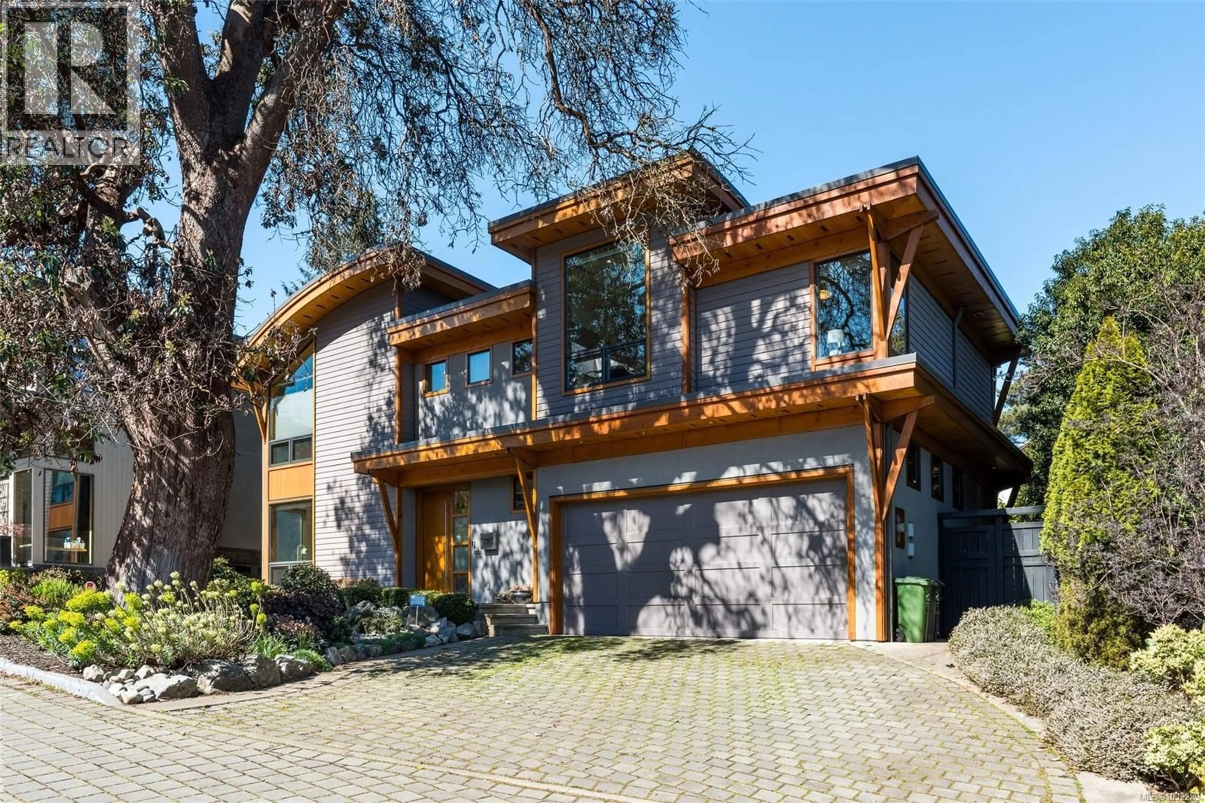 Home with brick exterior material, street for 220 MOSS ROCK PLACE, Victoria British Columbia V8S1E6