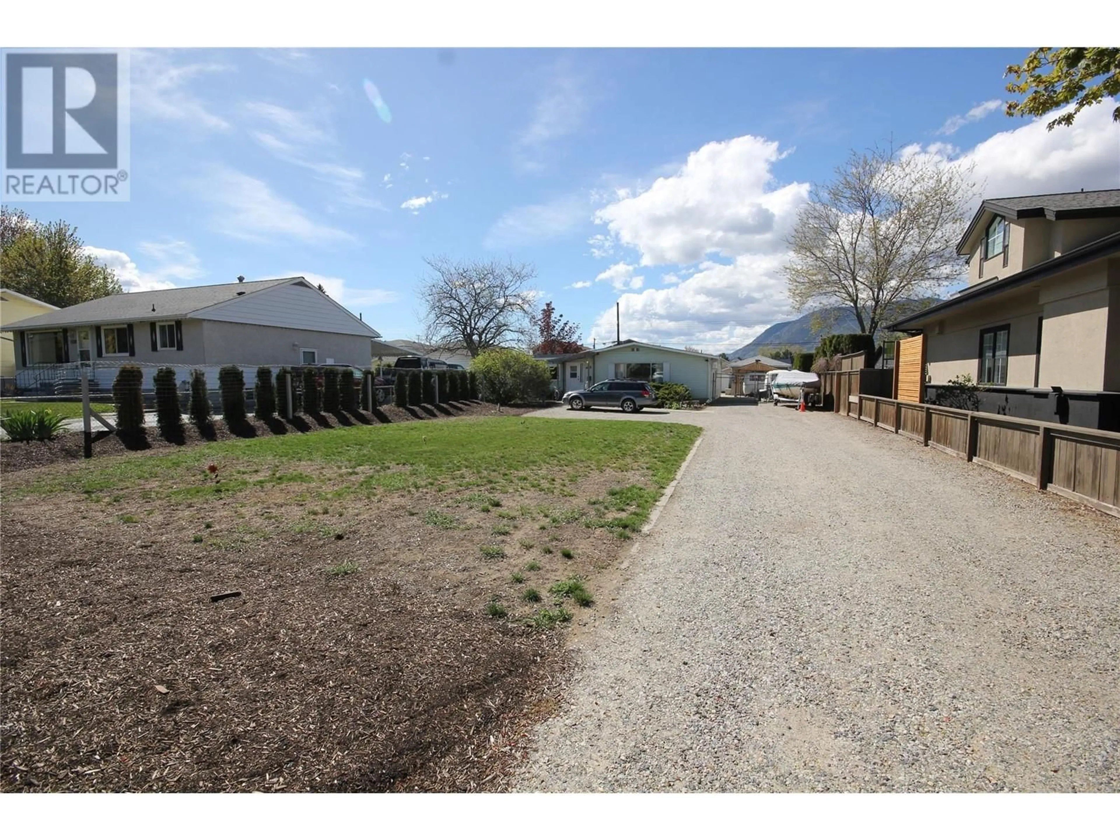 Frontside or backside of a home, the street view for 402 CONKLIN Avenue, Penticton British Columbia V2A2T4