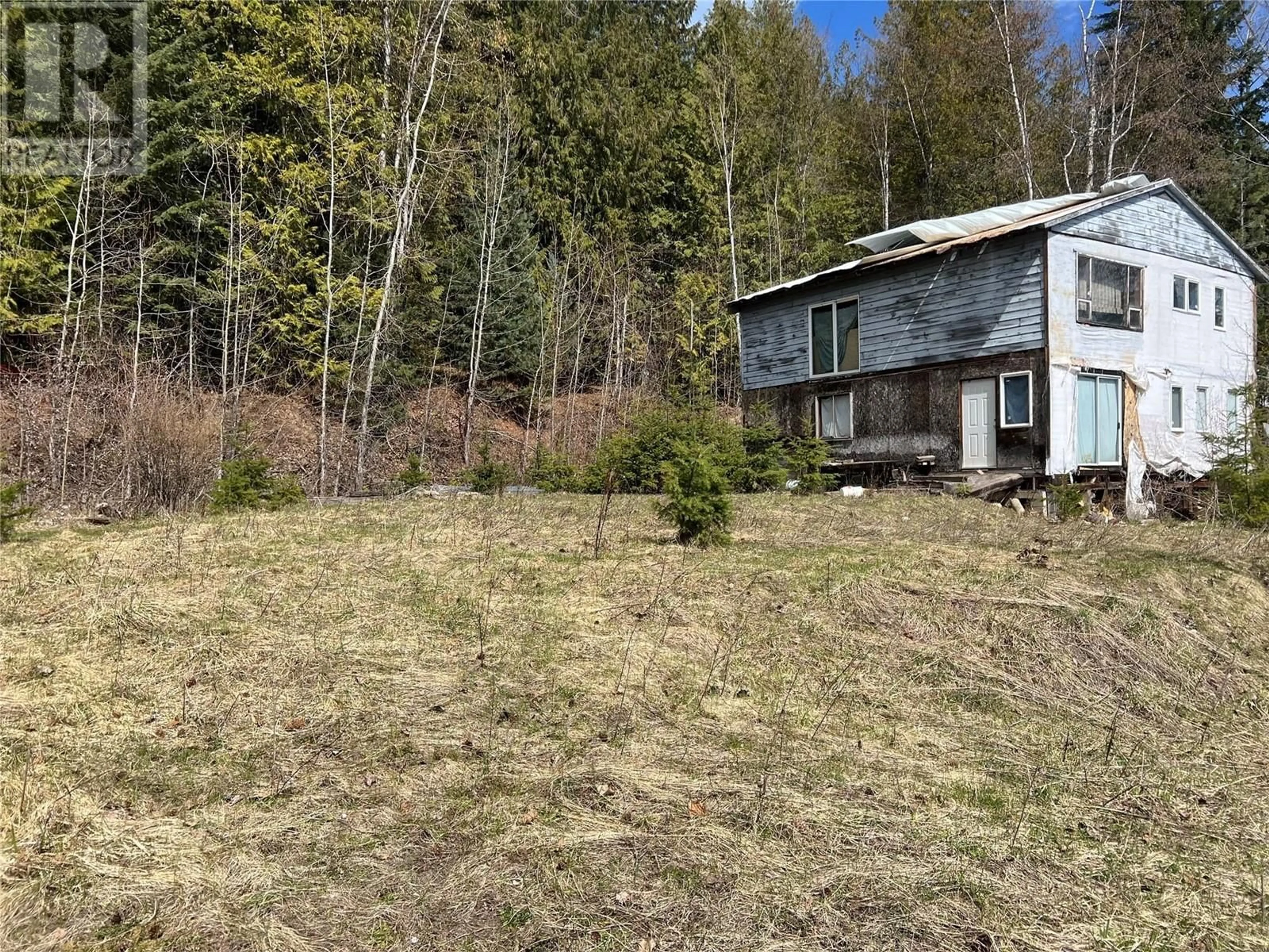 Frontside or backside of a home, cottage for 7497 Anglemont Way, Anglemont British Columbia V0E1M8