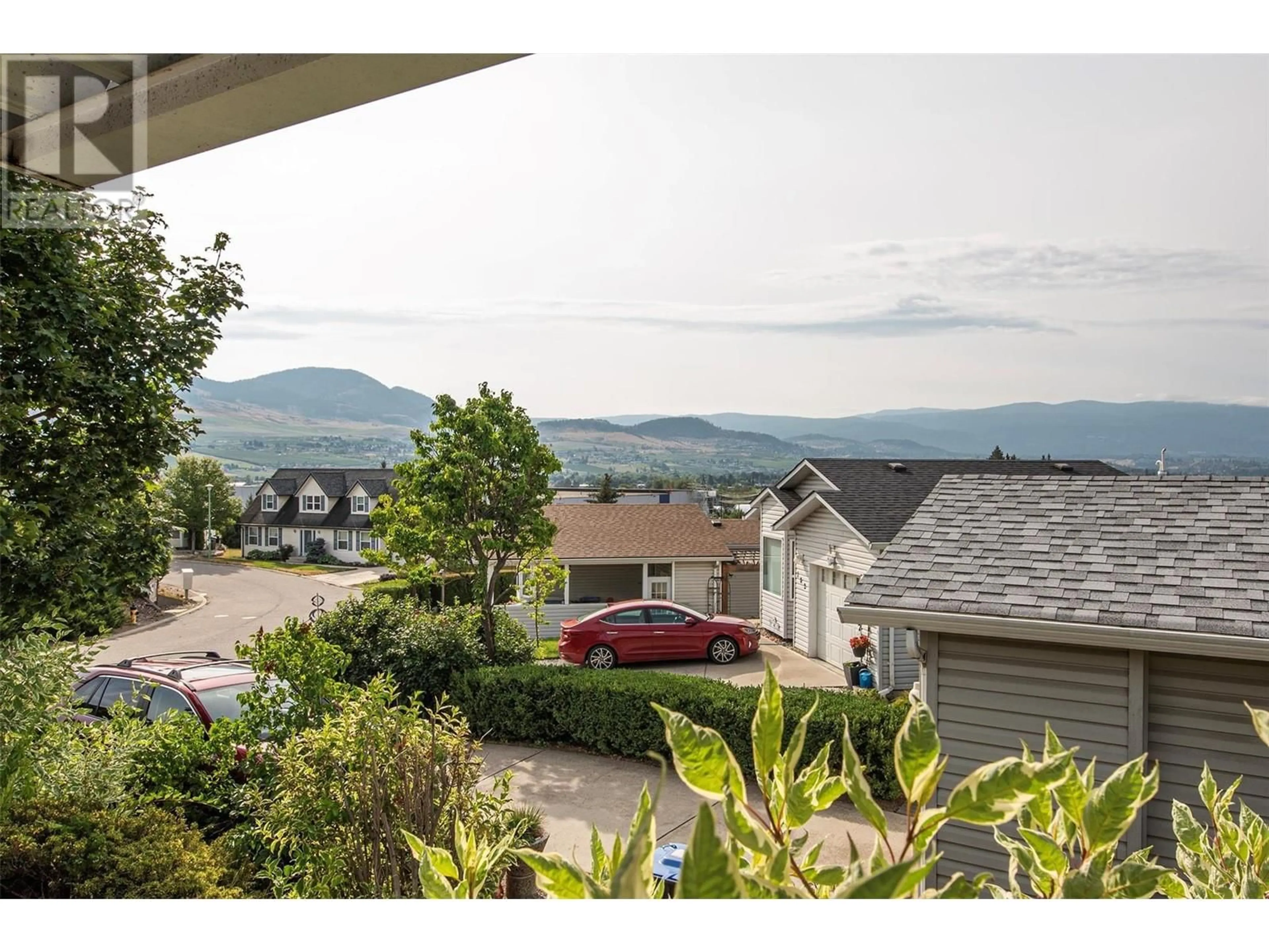 A pic from exterior of the house or condo, the view of mountain for 2550 Hollywood Road Unit# 104, Kelowna British Columbia V1V2S6