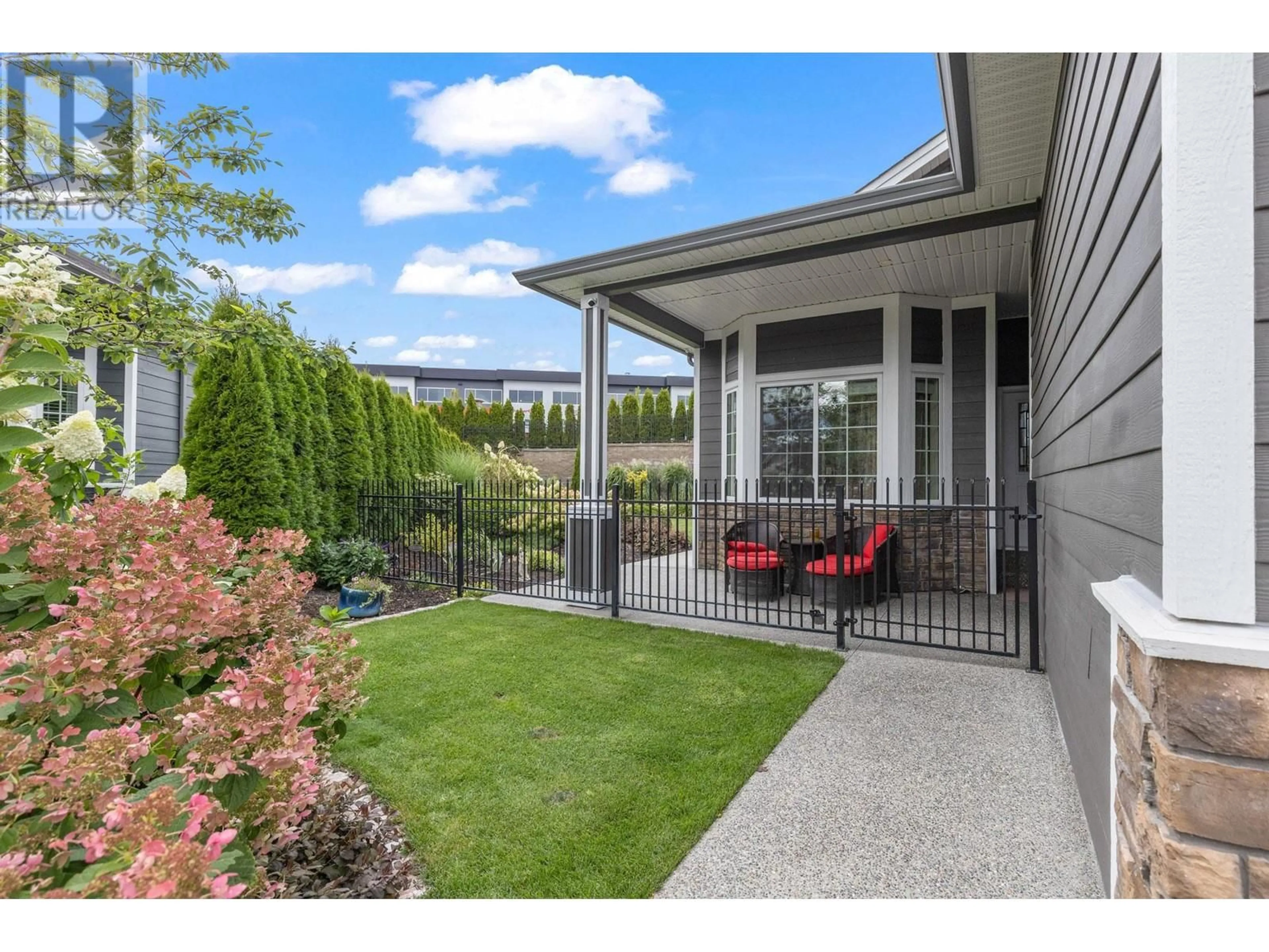 Patio, the fenced backyard for 2072 Sage Crescent, Westbank British Columbia V4T3A5