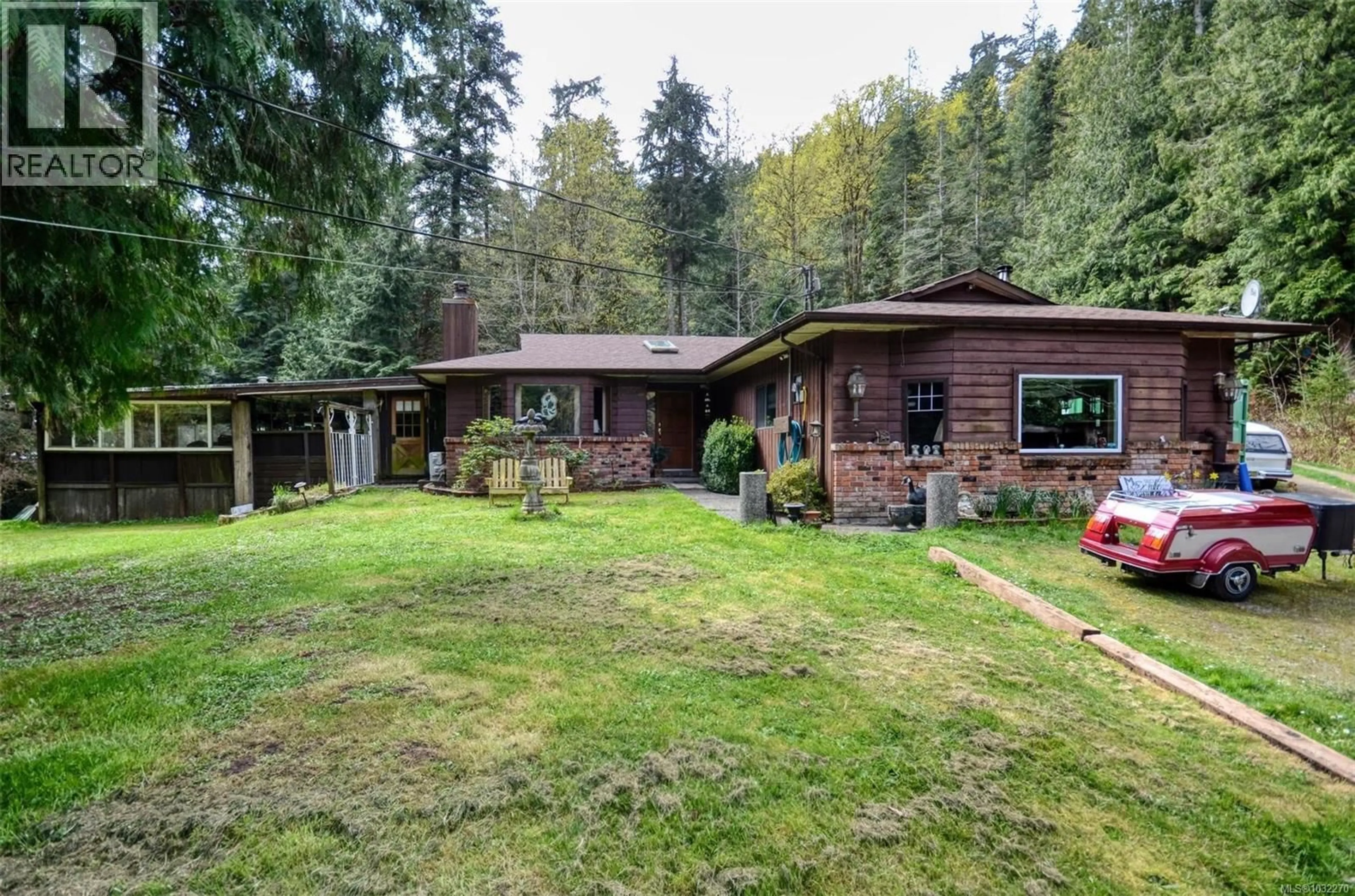 A pic from outside/outdoor area/front of a property/back of a property/a pic from drone, forest/trees view for 3780 SOOKE ROAD, Metchosin British Columbia V9C4B8