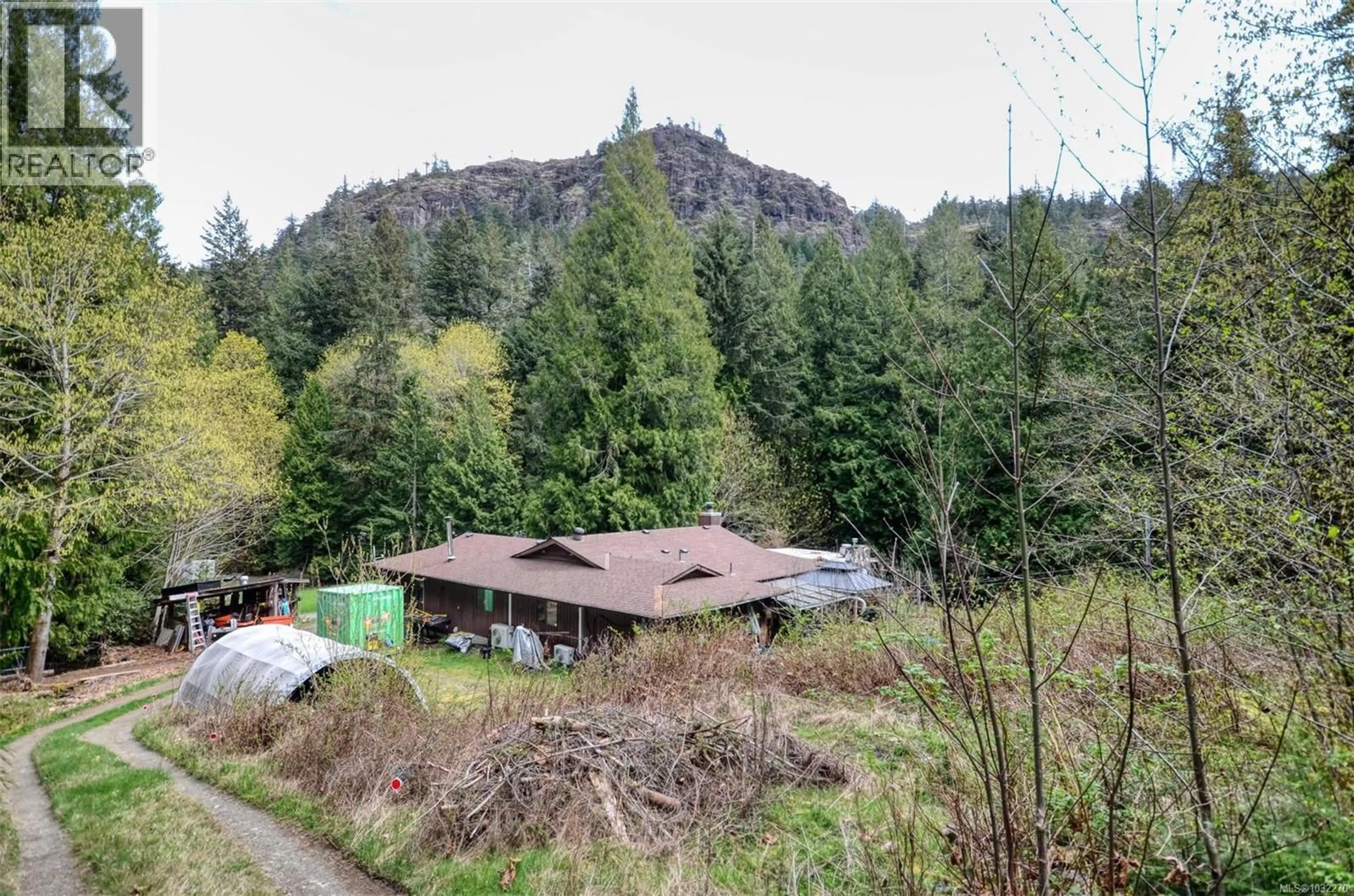 A pic from outside/outdoor area/front of a property/back of a property/a pic from drone, forest/trees view for 3780 SOOKE ROAD, Metchosin British Columbia V9C4B8
