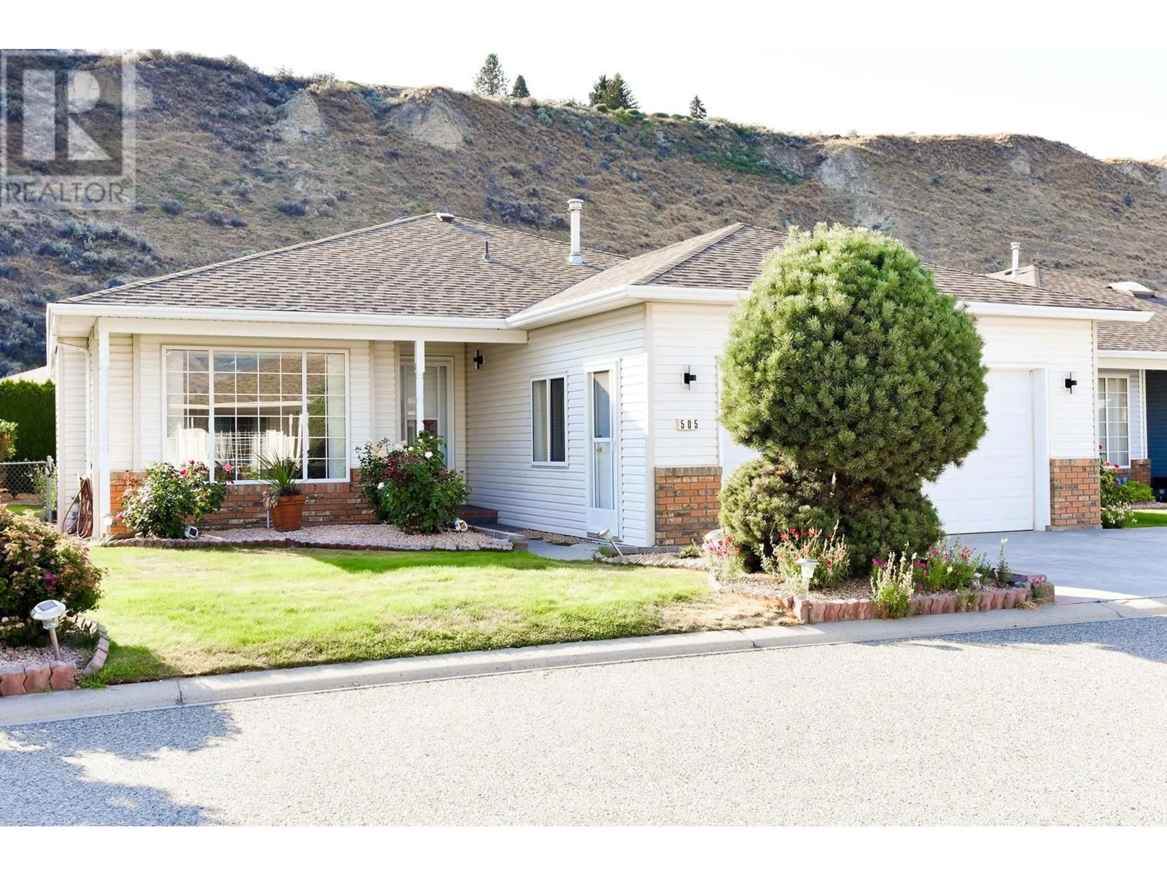 Home with vinyl exterior material, street for 505 REDWING DRIVE, Penticton British Columbia V2A8N7
