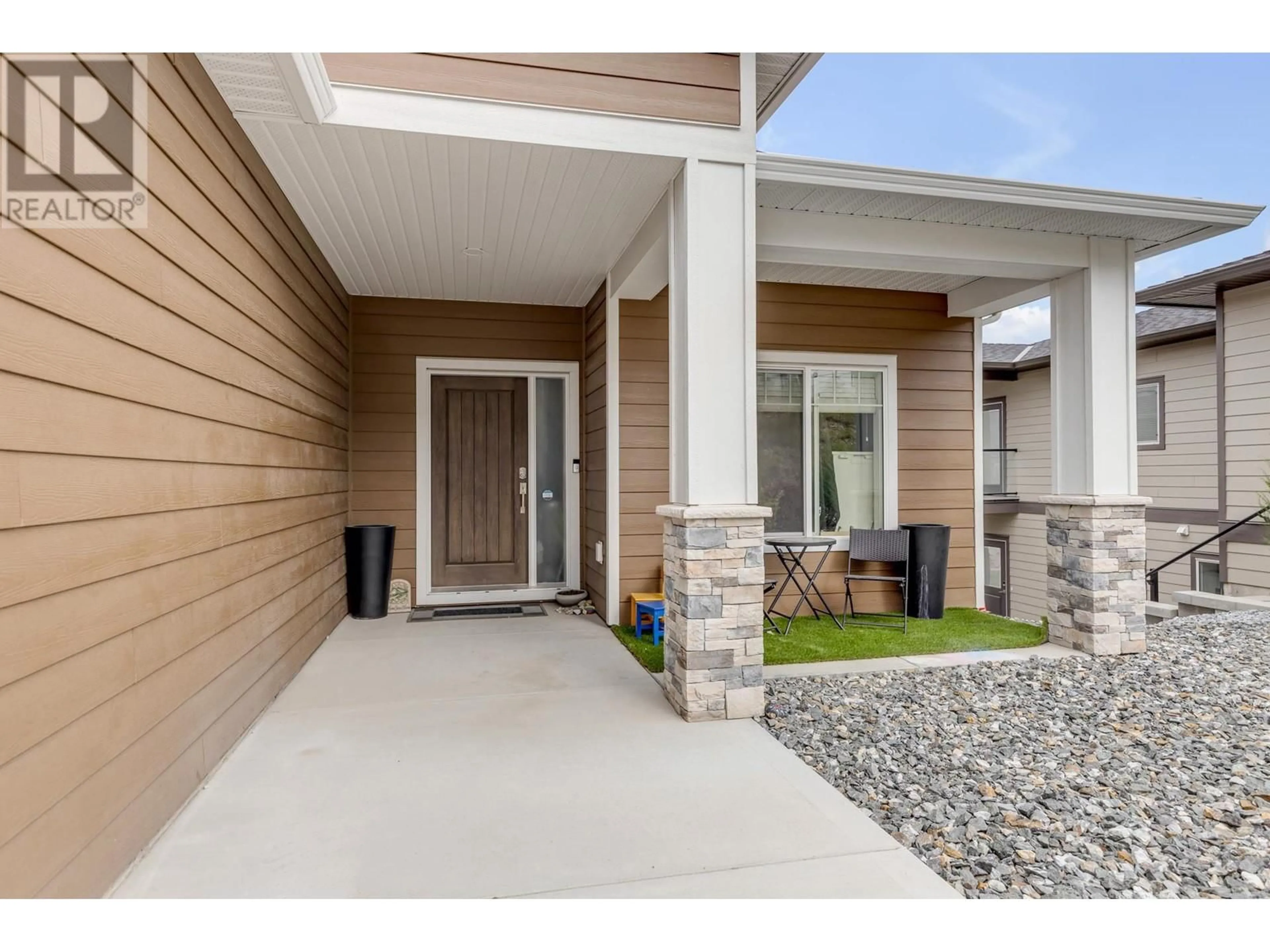 Indoor entryway, cement floor for 691 Yorkville Street, Kelowna British Columbia V1V0A9