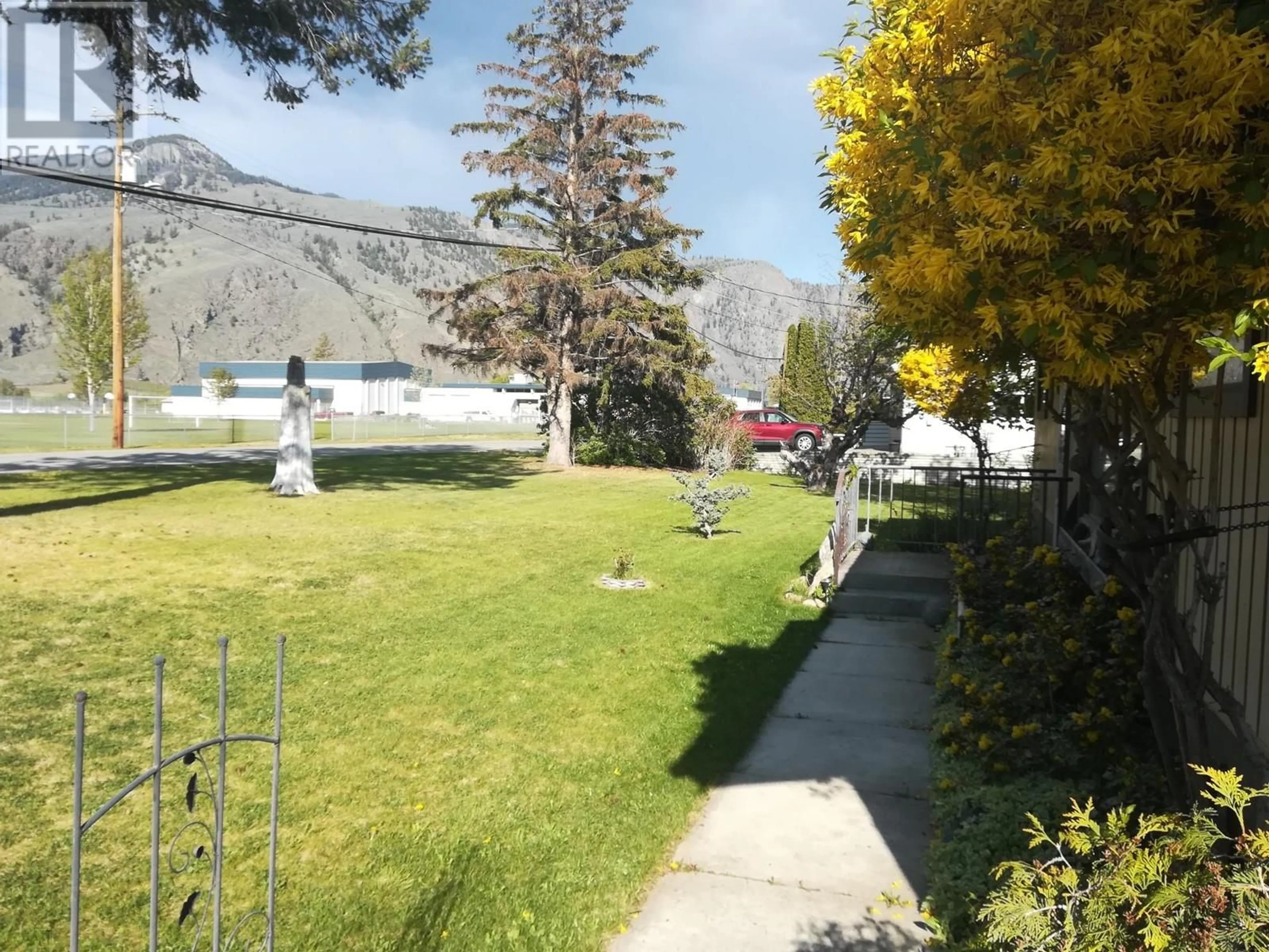 A pic from outside/outdoor area/front of a property/back of a property/a pic from drone, mountain view for 725 2ND AVE AVENUE, Keremeos British Columbia V0X1N2