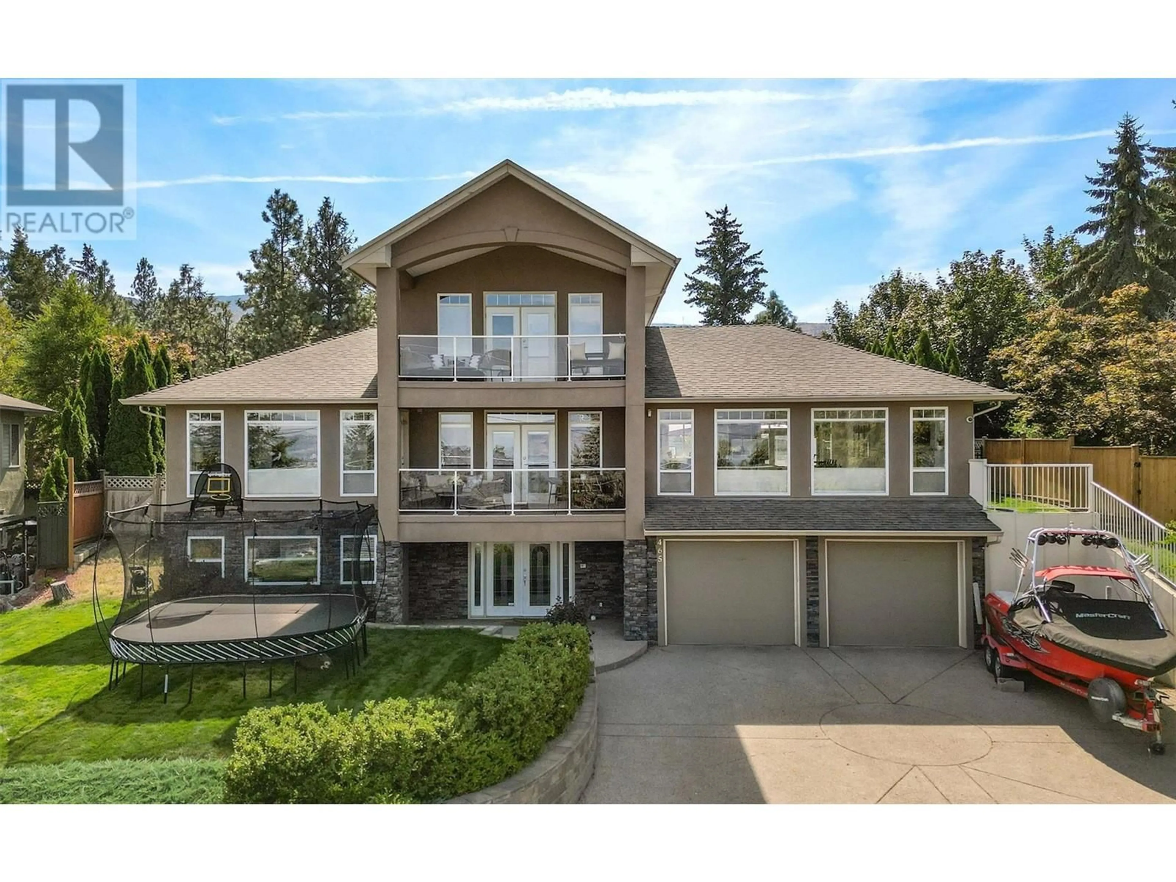 Frontside or backside of a home for 465 Okaview Road, Kelowna British Columbia V1W4L3