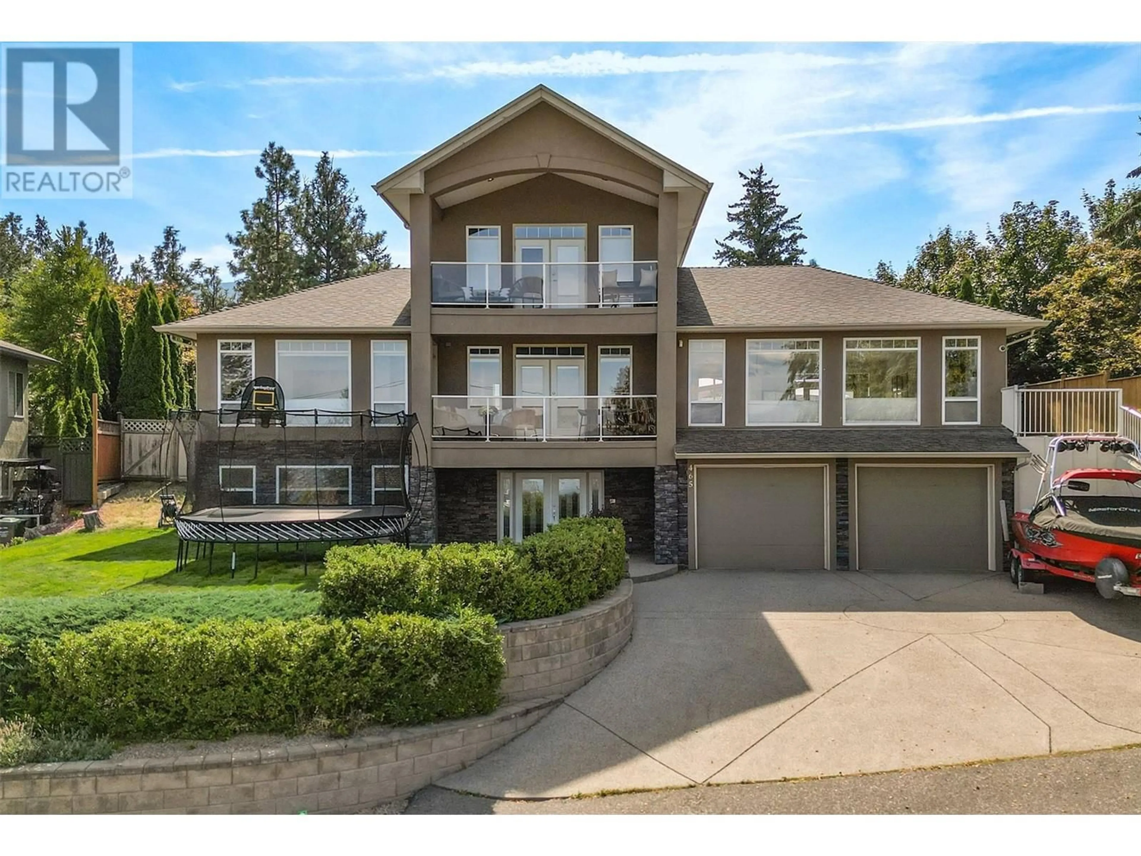 Frontside or backside of a home for 465 Okaview Road, Kelowna British Columbia V1W4L3